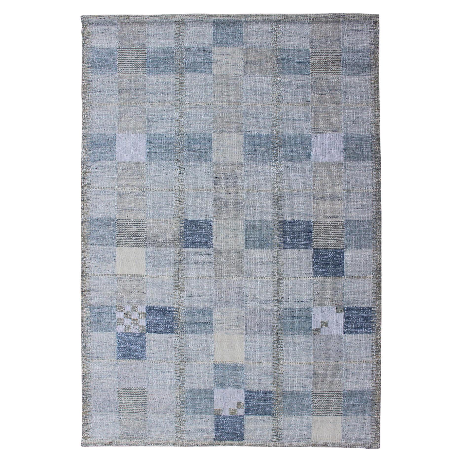 Tappeto a trama piatta in stile scandinavo con disegno a scacchiera in grigio e blu