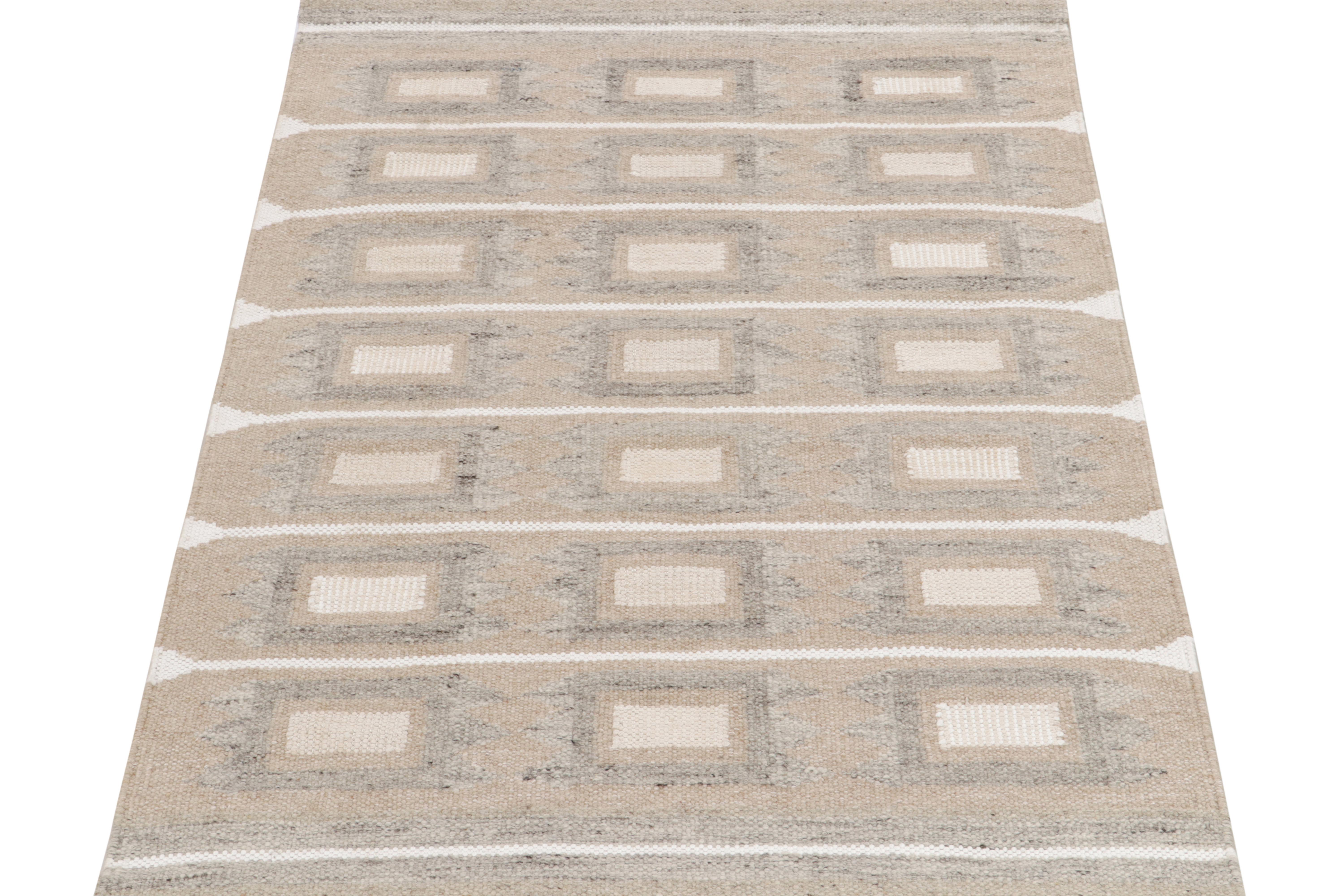 Handwoven in wool, a smart take on Swedish flatweaves from Rug & Kilim’s acclaimed Scandinavian Kilim collection. The 4x6 rug features an interplay of geometric repetition on defined panels in subtle tones of brown, white & gray further—all