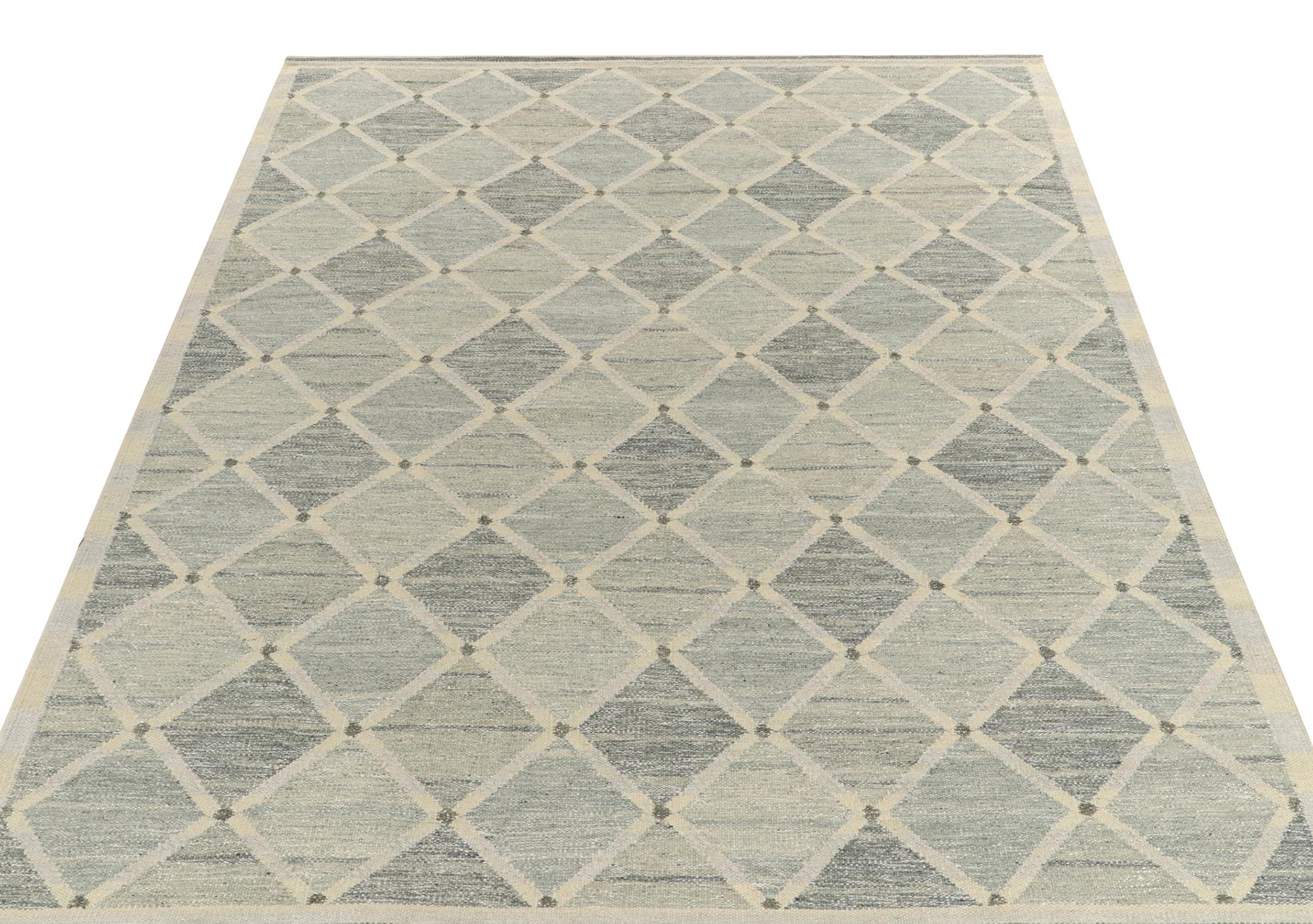 A 9x12 flat weave from Rug & Kilim’s Scandinavian Kilim Collection. The piece carries a cool composure with soothing tones of blue and gray covering the scale with a clean & classic abrashed look. The alluring texture beautifully accompanying the