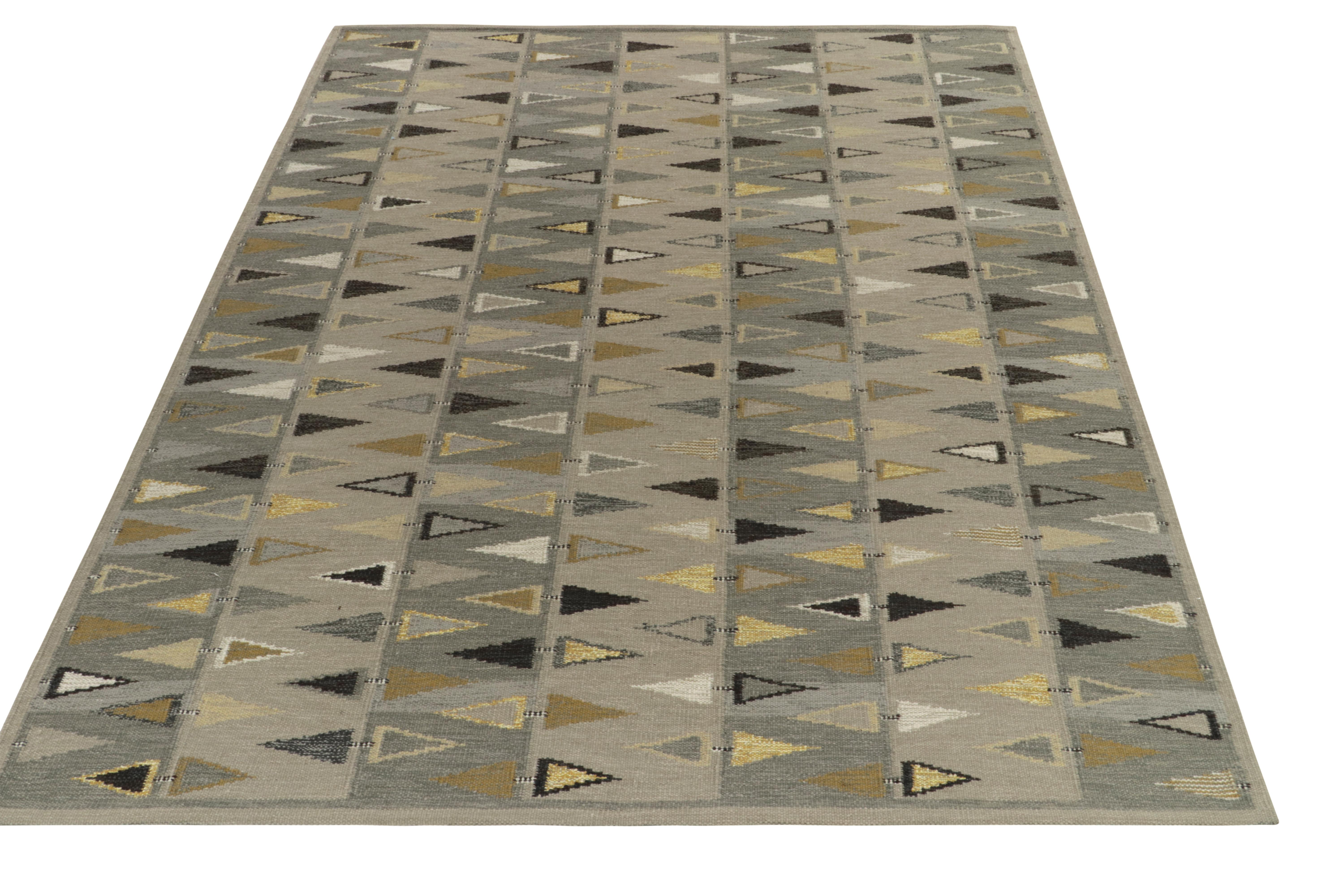 From our award-winning flatweave selections, a 9’7x12’2 Scandinavian style kilim rug showcasing unique movement & pleasing Mid-Century Modern symmetry. Handwoven in wool, the crisp geometry embodies the smartness lent by alternating tones of ochre,