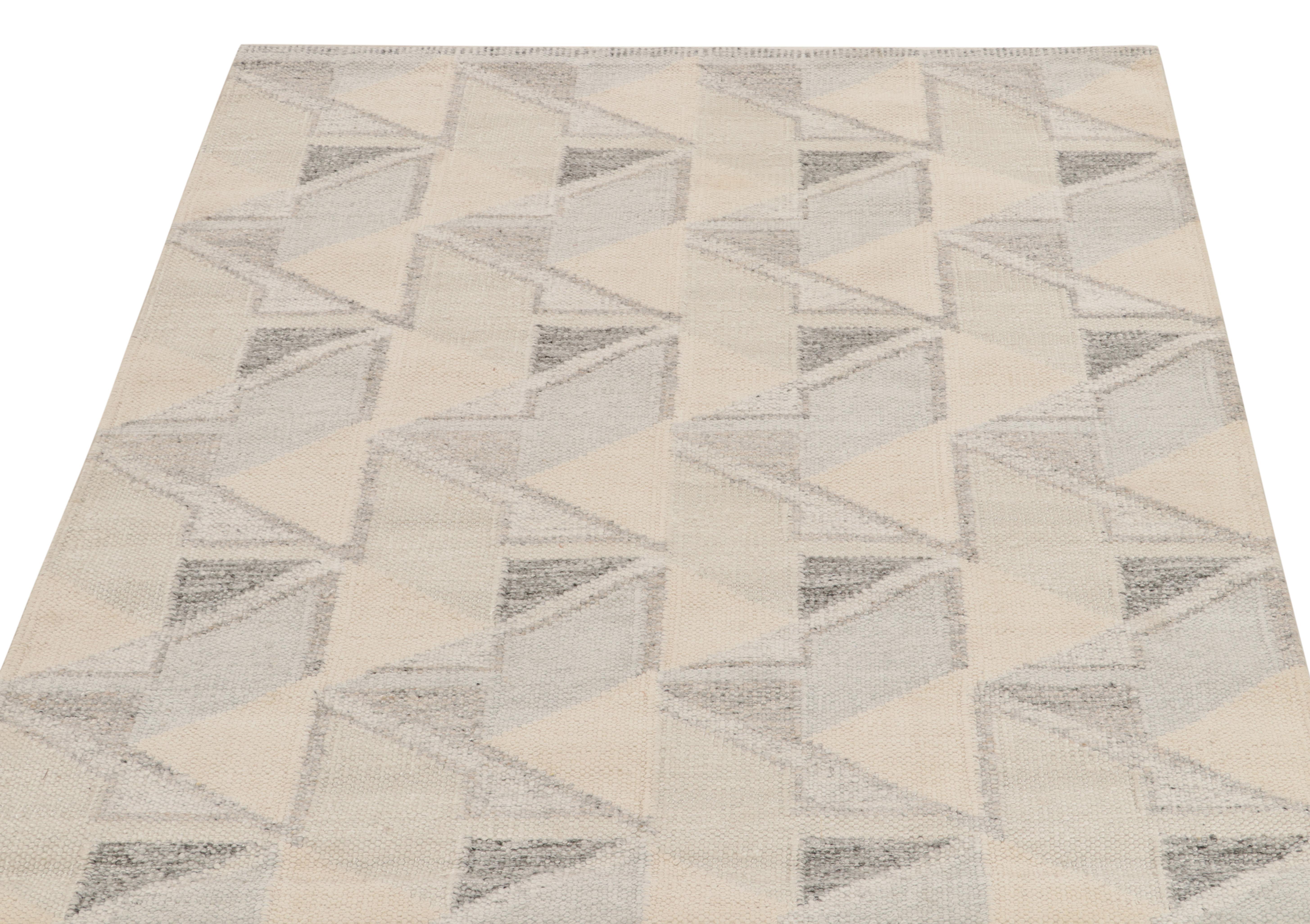 Rug & Kilim takes pride in introducing this unique interpretation of Scandinavian style from its award-winning flatweave selections inspired by the historic style. Handwoven in fine quality wool, this almost square rendering features a sharp