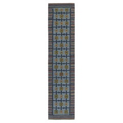 Tapis de course Kilim de style scandinave à motif géométrique bleu et vert par Rug
Kilim