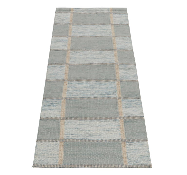 A 3x7 flat weave from Rug & Kilim’s award-winning Scandinavian Collection. This particular runner enjoys a cool tone with a clean geometric pattern in soothing hues of blue and luscious beige for a refreshing colorway. Recapturing mid-century