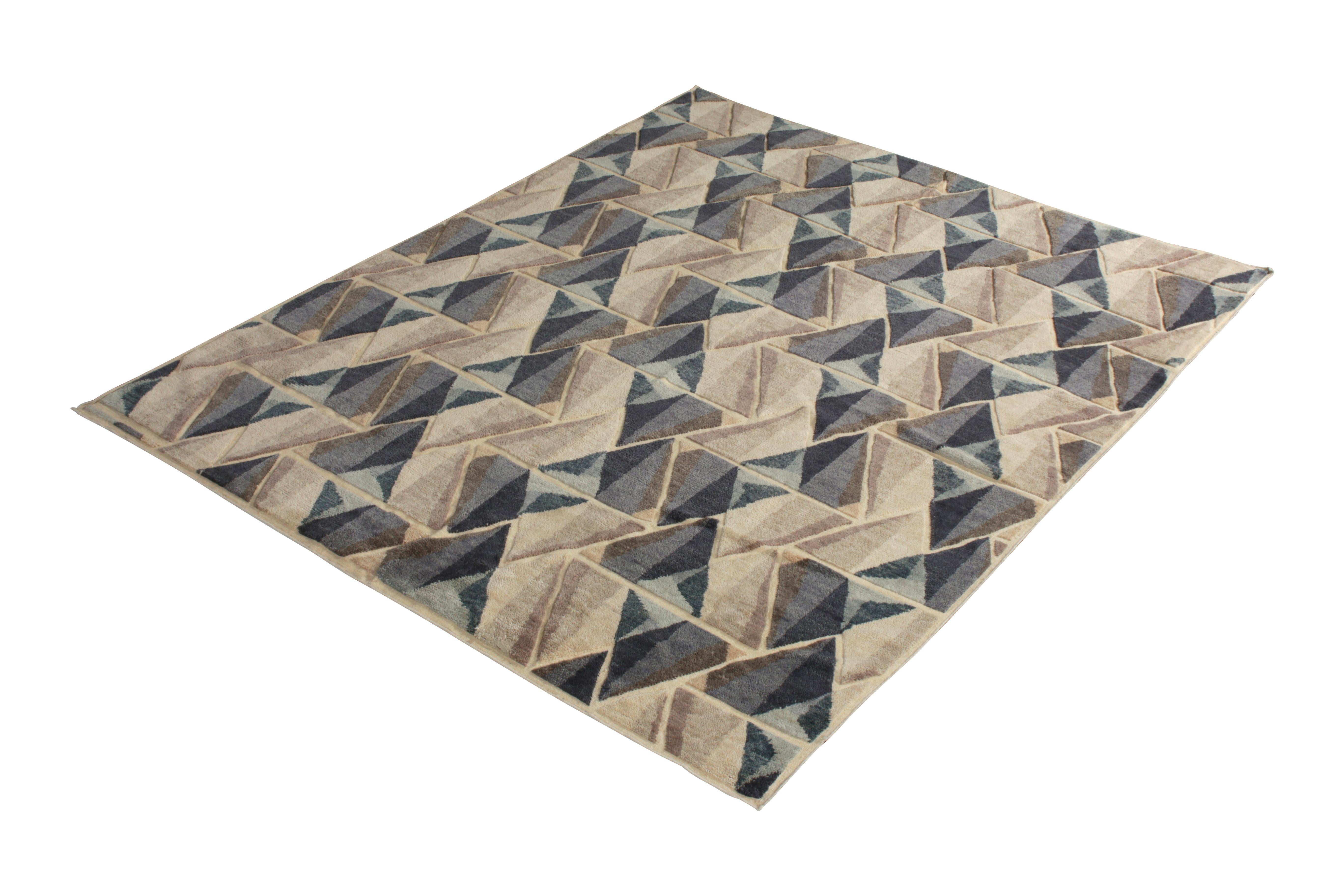 Hand knotted in texturally soft, durable wool pile, this modern 8 x 10 rug hails from the latest pile additions to Rug & Kilim’s Scandinavian collection, a celebration of Swedish modernism with new large scale geometry and exciting vintage colorways