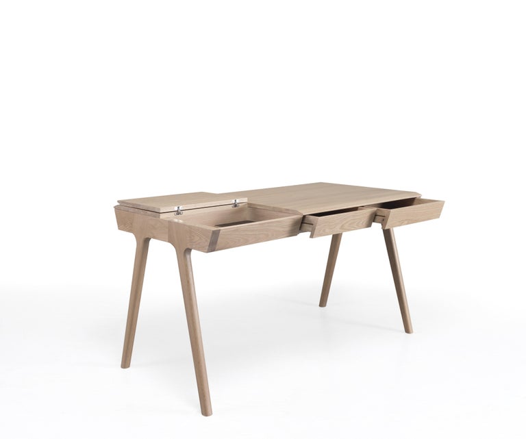 Beautifull Nordic style compact desk made of solid wood, oak or walnut (chosen by the buyer) offering a real storage solution with three drawers, one secret compartment and two lidded sections.
Priced as the walnut model.
Packed in plywood box.