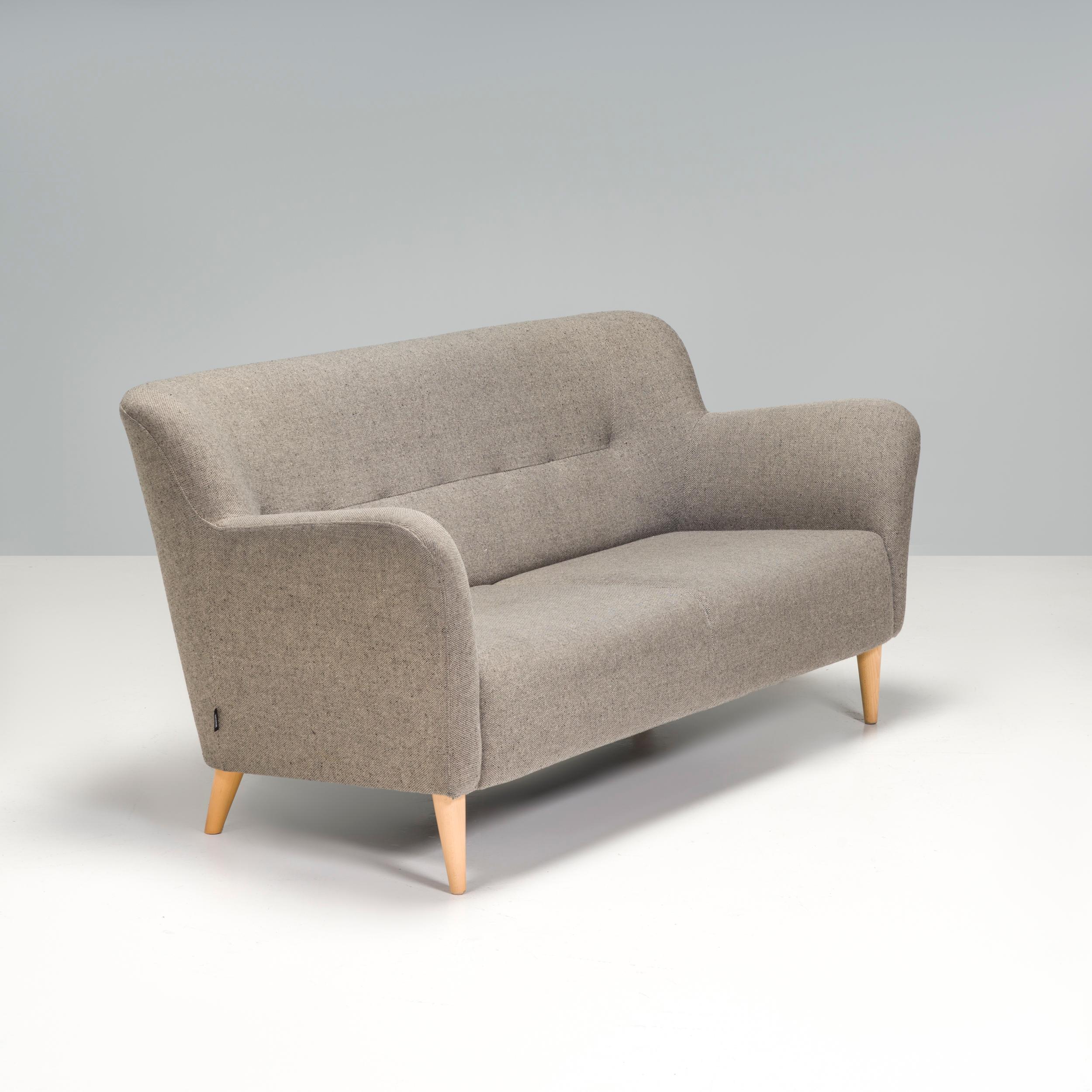 
The Swedese Nova 2 Seater Sofa, designed by Claesson Koivisto Rune for Swedese, is a two seater sofa with a distinctive yet classic form. 

The deep seat and high sculptured armrests propose an alluring and striking profile which accentuates