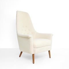 Scandinavian SWEDISH HIGH BACK LOUNGE CHAIR IN FAUX SHEEPSKIN