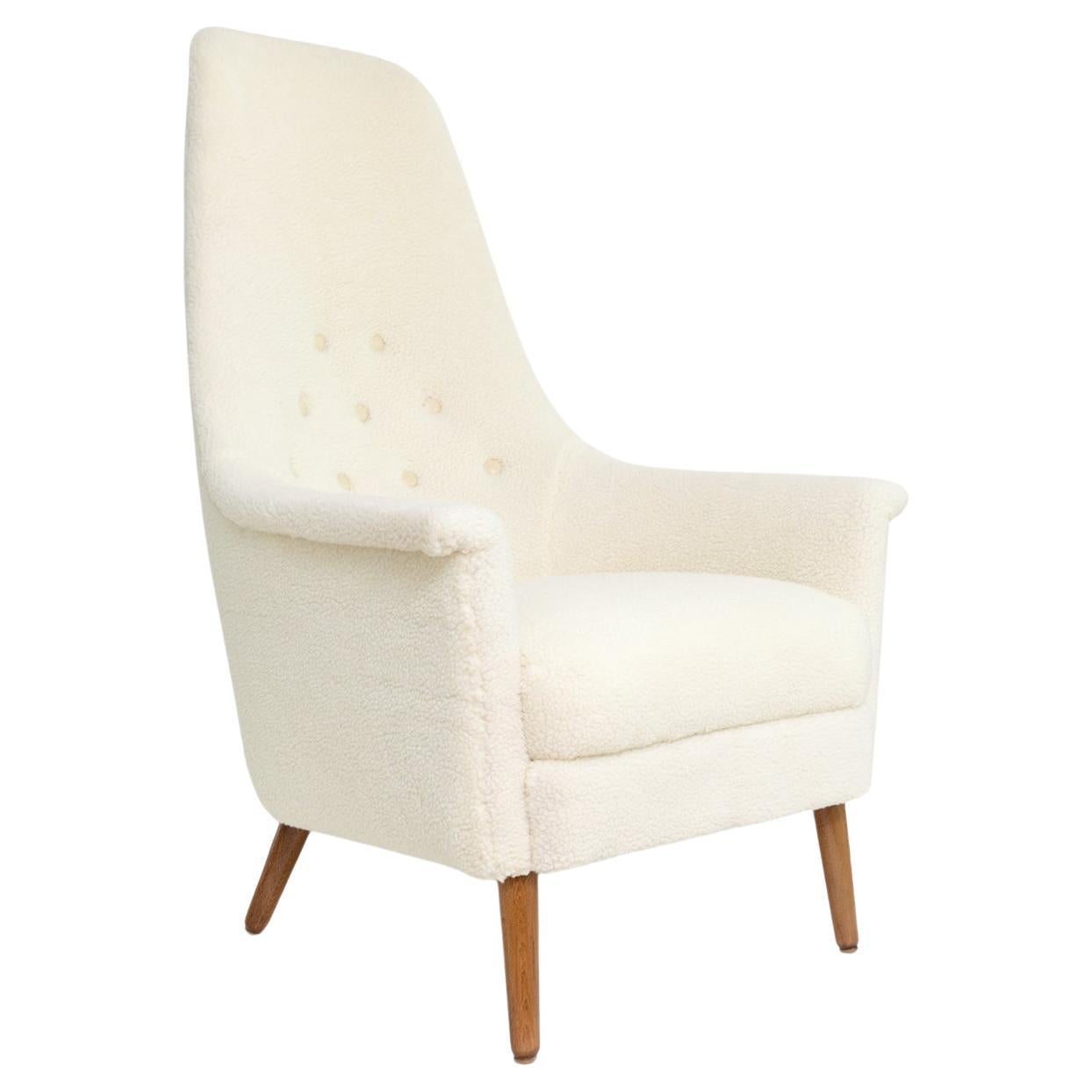 Scandinavian SWEDISH HIGH BACK LOUNGE CHAIR IN FAUX SHEEPSKIN