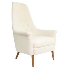 Retro Scandinavian SWEDISH HIGH BACK LOUNGE CHAIR IN FAUX SHEEPSKIN