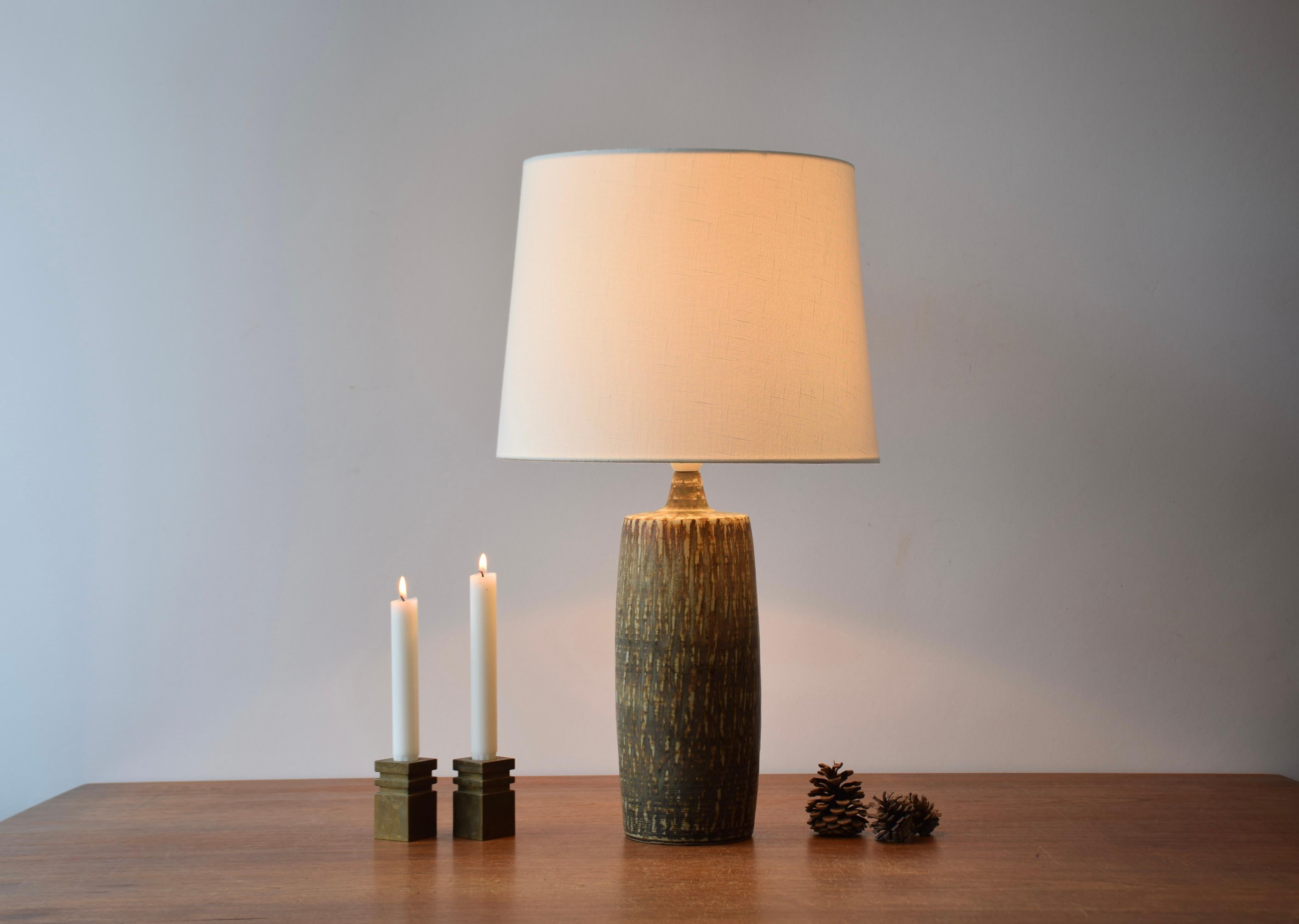 Tall ceramic table lamp by Gunnar Nylund for Rörstrand, Sweden.
It´s part of the 