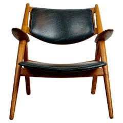 Chaise scandinave CH28 en teck et cuir noir par Hans Wegner pour Carl Hansen