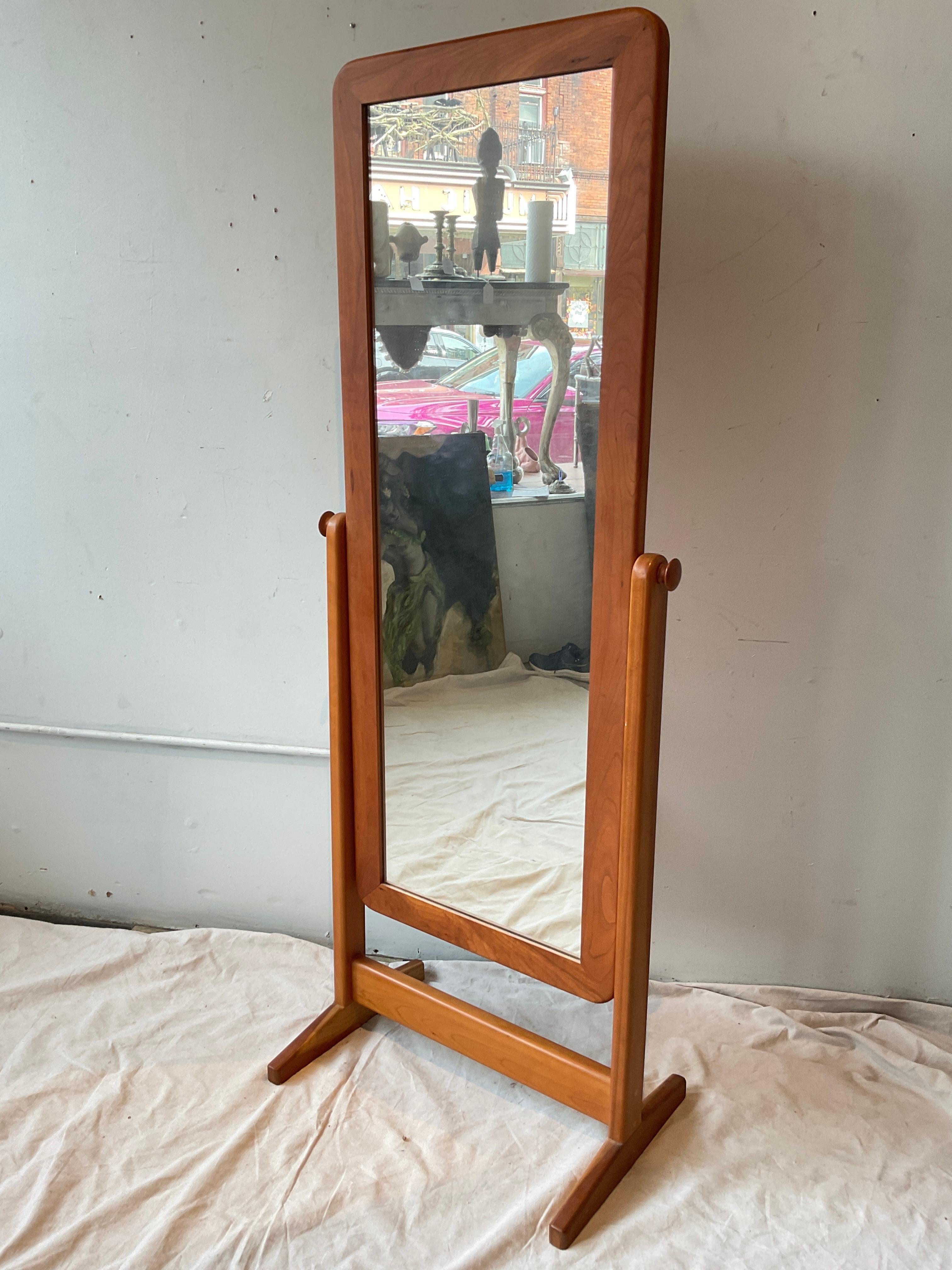 Scandinavian teak cheval  mirror with finished back.