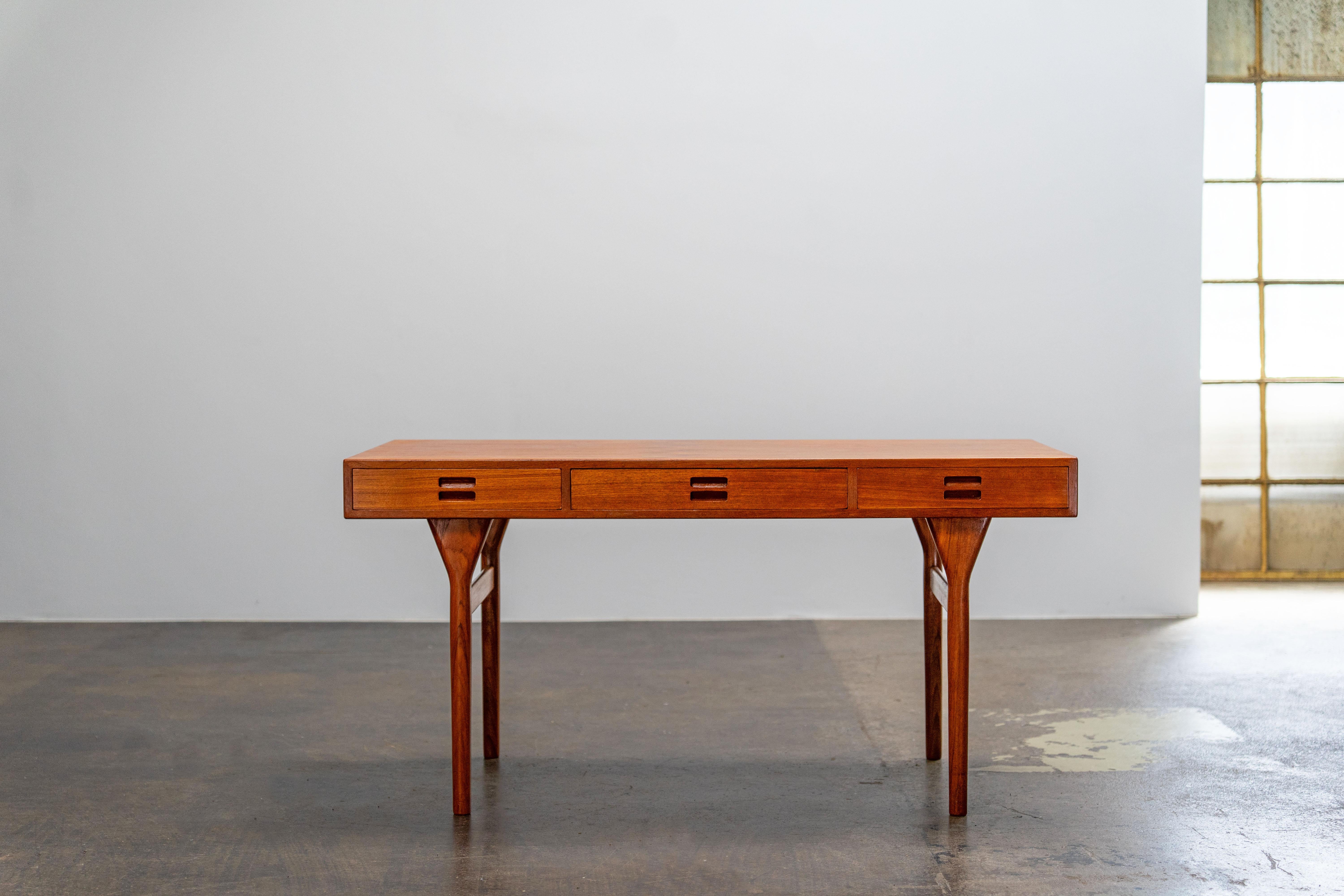 Teak Desk by Nanna Ditzel
Søren Willardsen, Denmark

Teak desk with three drawers by Nanna Ditzel. The desk has a particularly beautiful grain.

Designer
    Nanna Ditzel
Manufacturer
    Søren Willadsen
Dimensions
    75 x 145 x 72.5 cm [DxWxH]