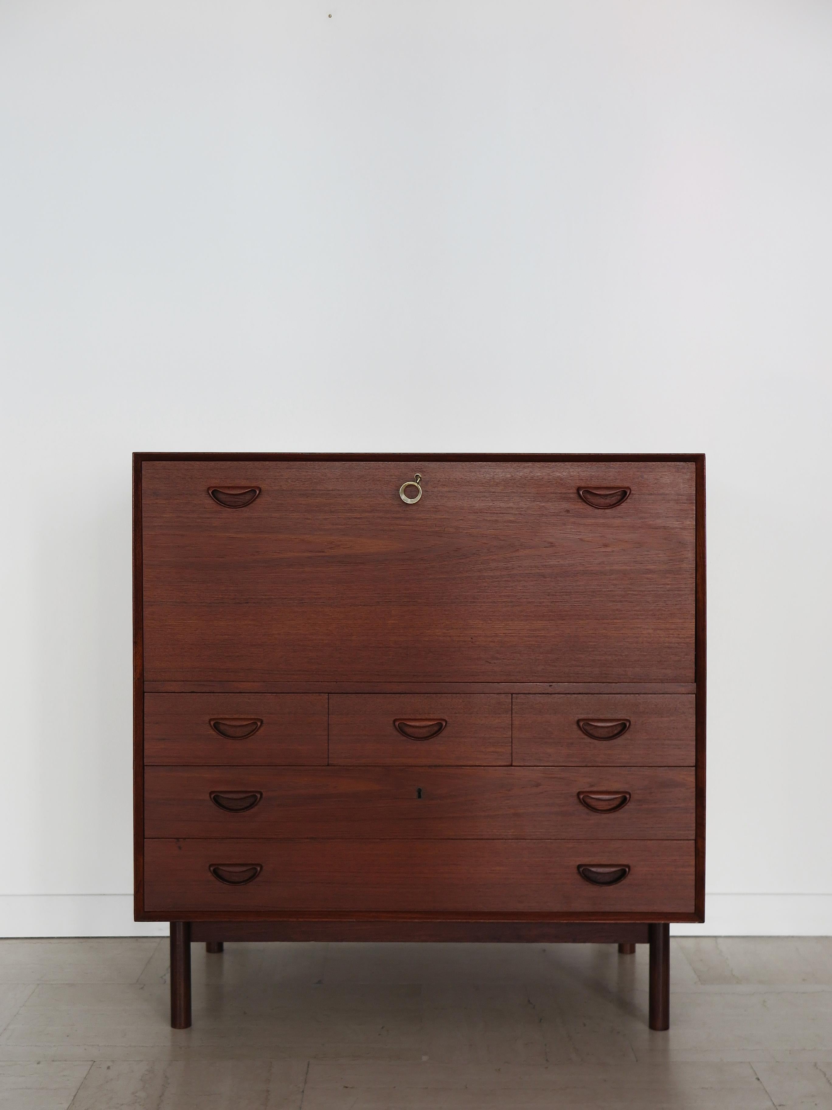Scandinavian midcentury modern design teak credenza cabinet or bar cabinet designed by Peter Hvidt & Orla Molgaard Nielsen for Soborg Mobelfabrik with flap door that becomes a writing desk, Denmark 1960s

Please note that the bar cabinet is original
