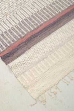 Scandinavian textile designer. Handwoven rug in pure wool, 1970s
