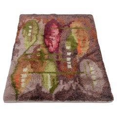 Scandinavian textile designer. Rya carpet in pure cotton. Polychrome design.