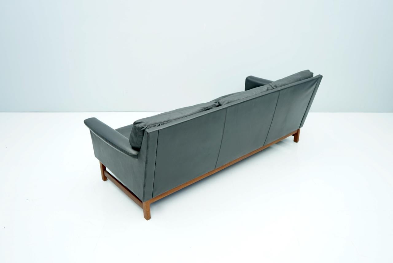 Scandinavian Modern Scandinavian Three-Seat Sofa in Teak Wood and Black Leather, 1960s For Sale