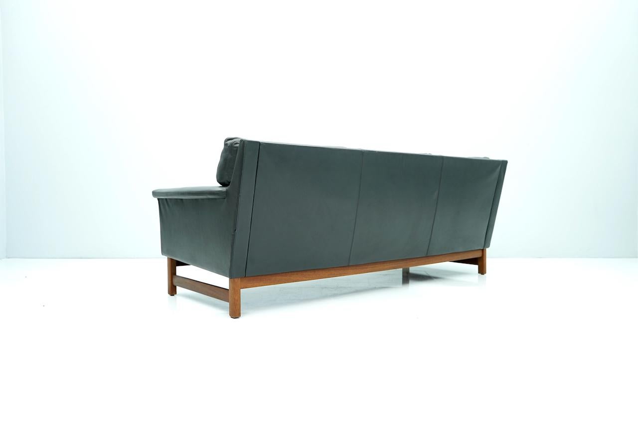 Danish Scandinavian Three-Seat Sofa in Teak Wood and Black Leather, 1960s For Sale