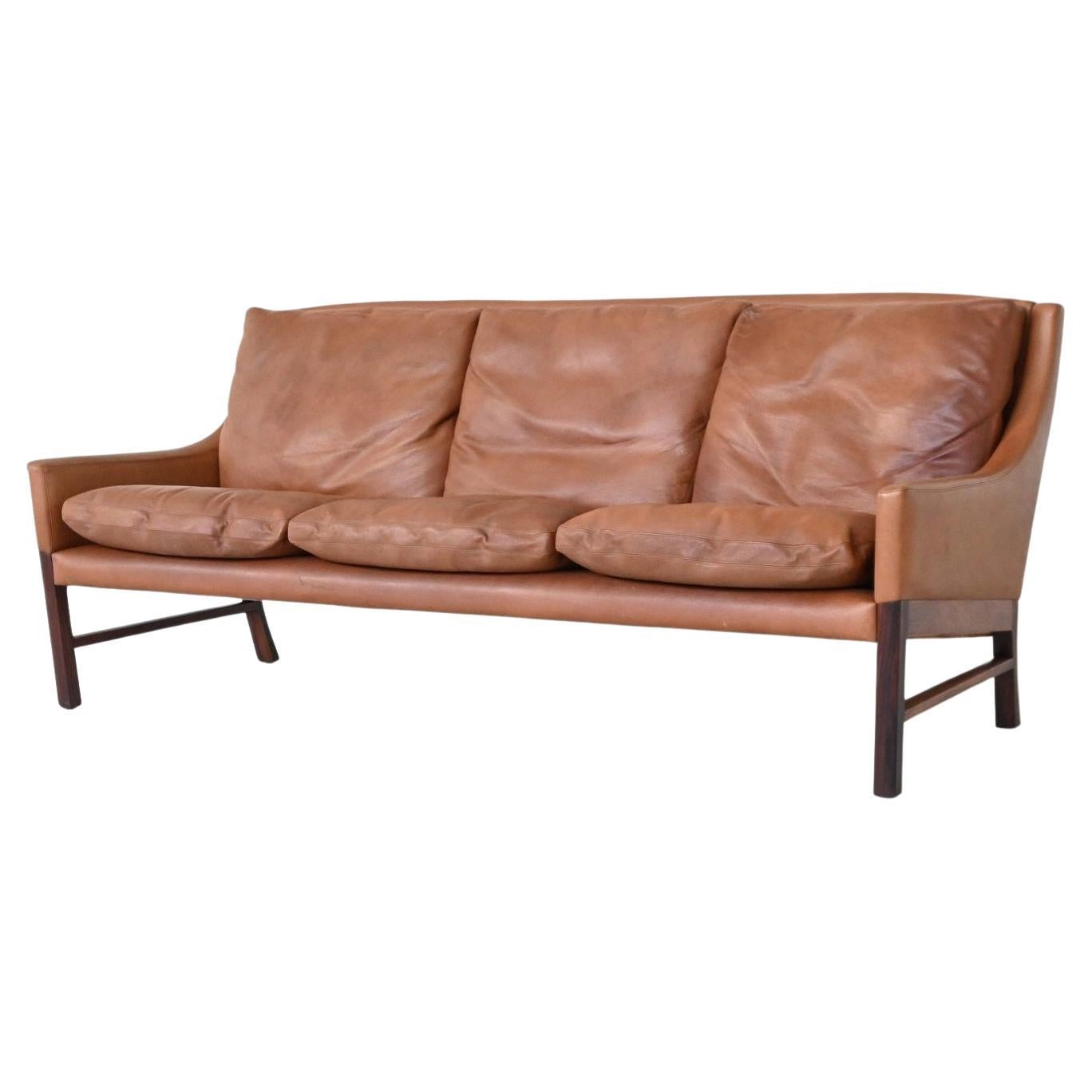 Divano scandinavo a tre posti in palissandro e pelle marrone Danimarca 1960