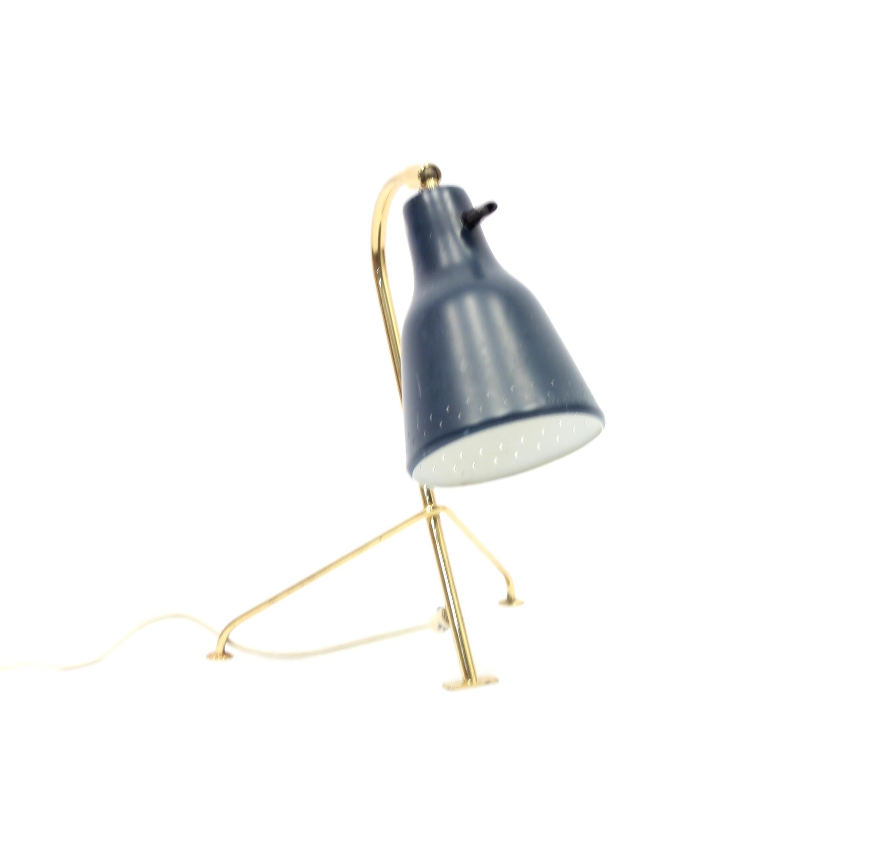 Scandinavian tripod brass table lamp with dark blue tin shade. Ware consistent with age and use.