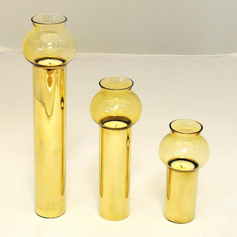 Scandinavian Modern Scandinavian Vintage Set of Three Brass Candleholders with Glass Shades 1960s
