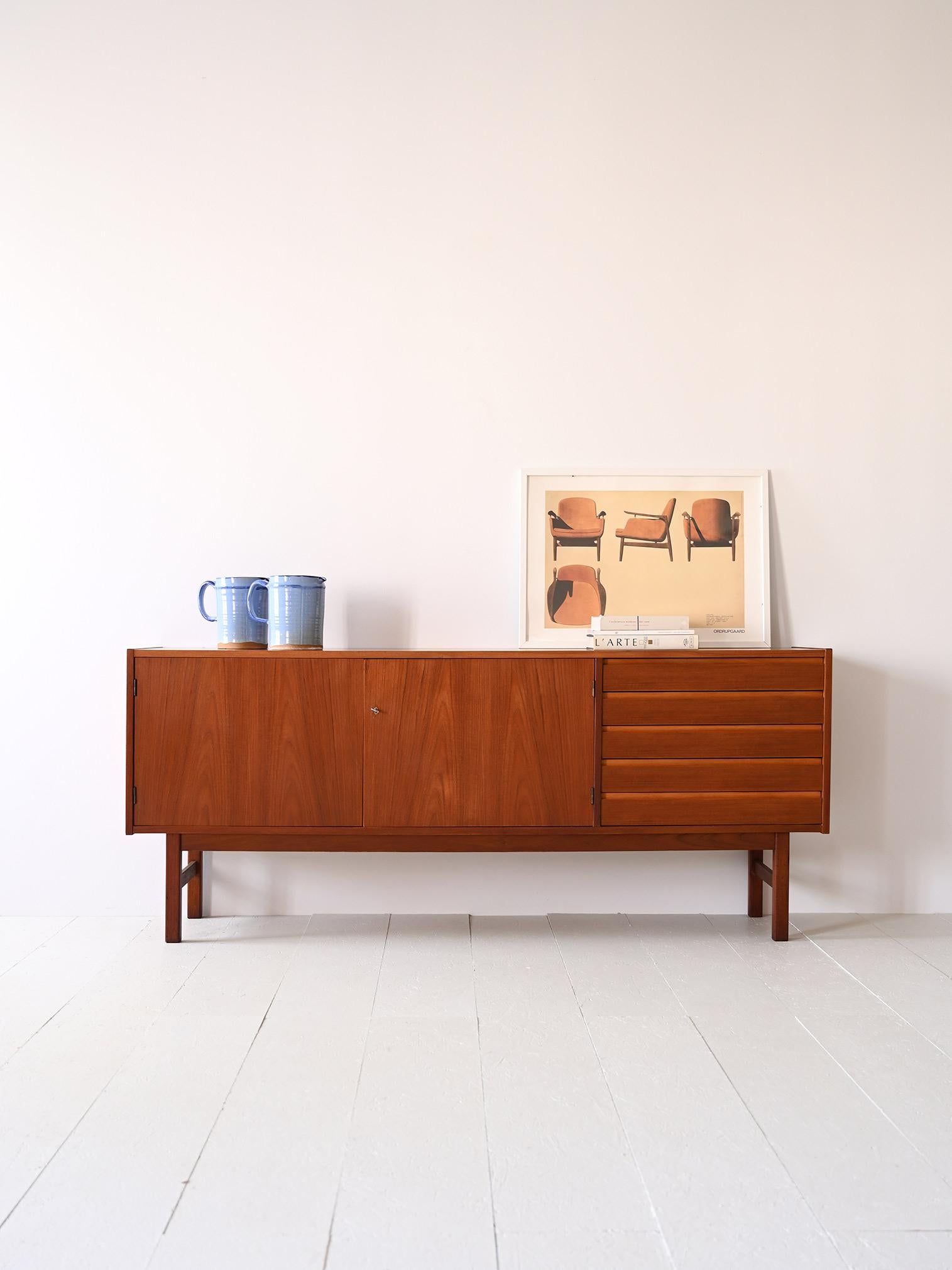 1960s sideboard designed by Erik Worts for Ikea.

A Swedish modern antique furniture piece in excellent condition that traces mid-century taste and style.
Formed by a frame with clean and minimal lines, it features 5 drawers with a hidden handle and