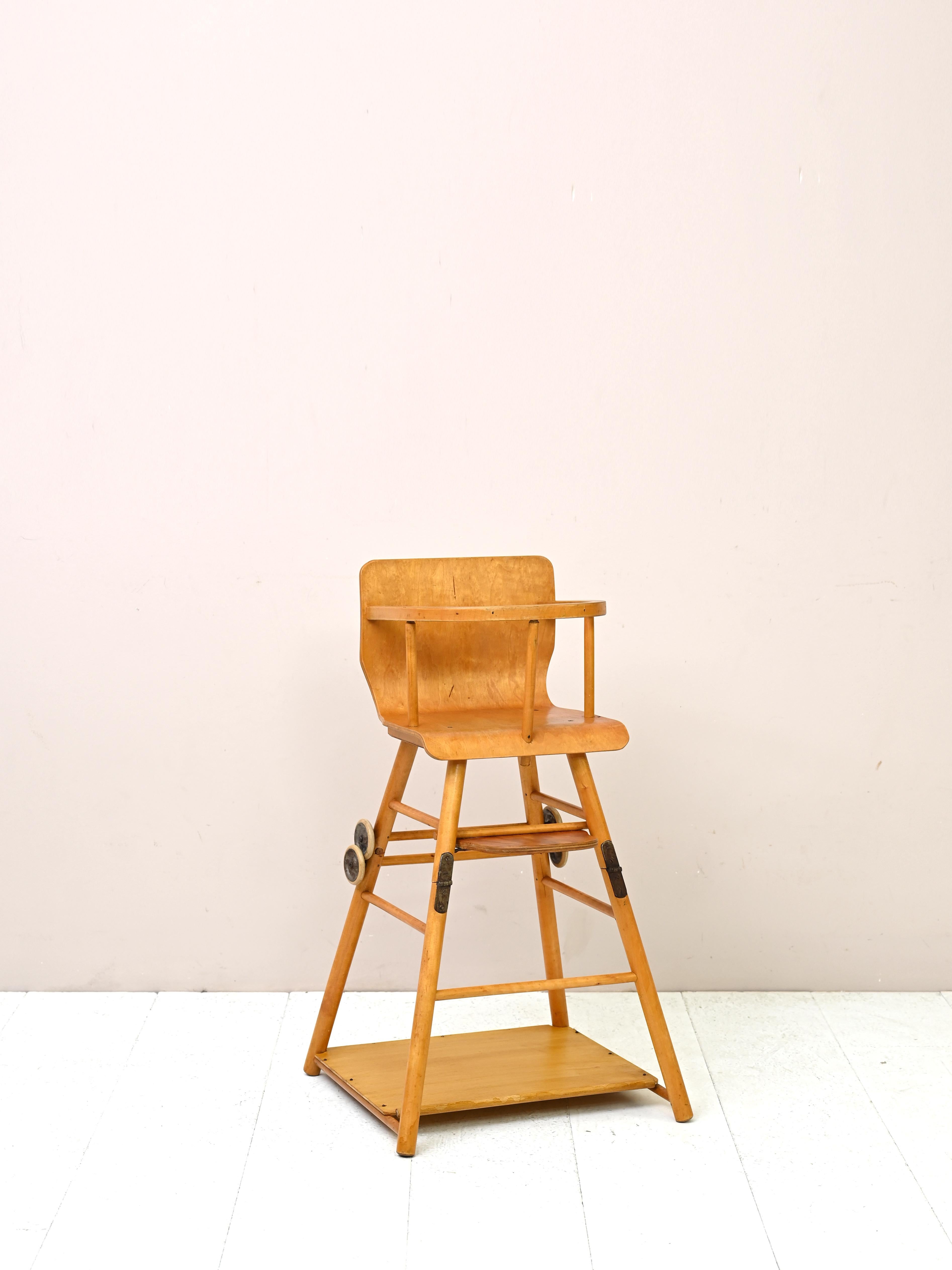 Original vintage baby chair and walker
A particular modern antique piece in very good condition with the dual function of high chair and walker.

Good condition. It has been restored with natural products. It may show some signs
of time. Please