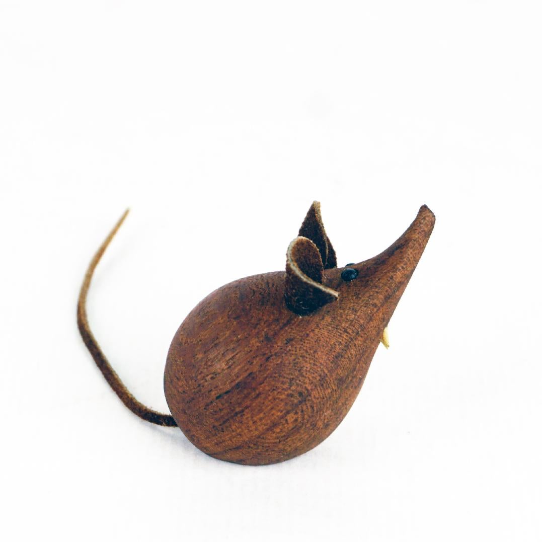 This Scandinavian Original vintage genuine wooden articulated toy mouse was designed in Denmark 1950s and produced by H F Denmark as it is marked on the underside.
 It is in wonderful condition, made from solid wood with ears and tail made of