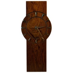 Horloge murale scandinave en bois de rose et laiton, années 1960