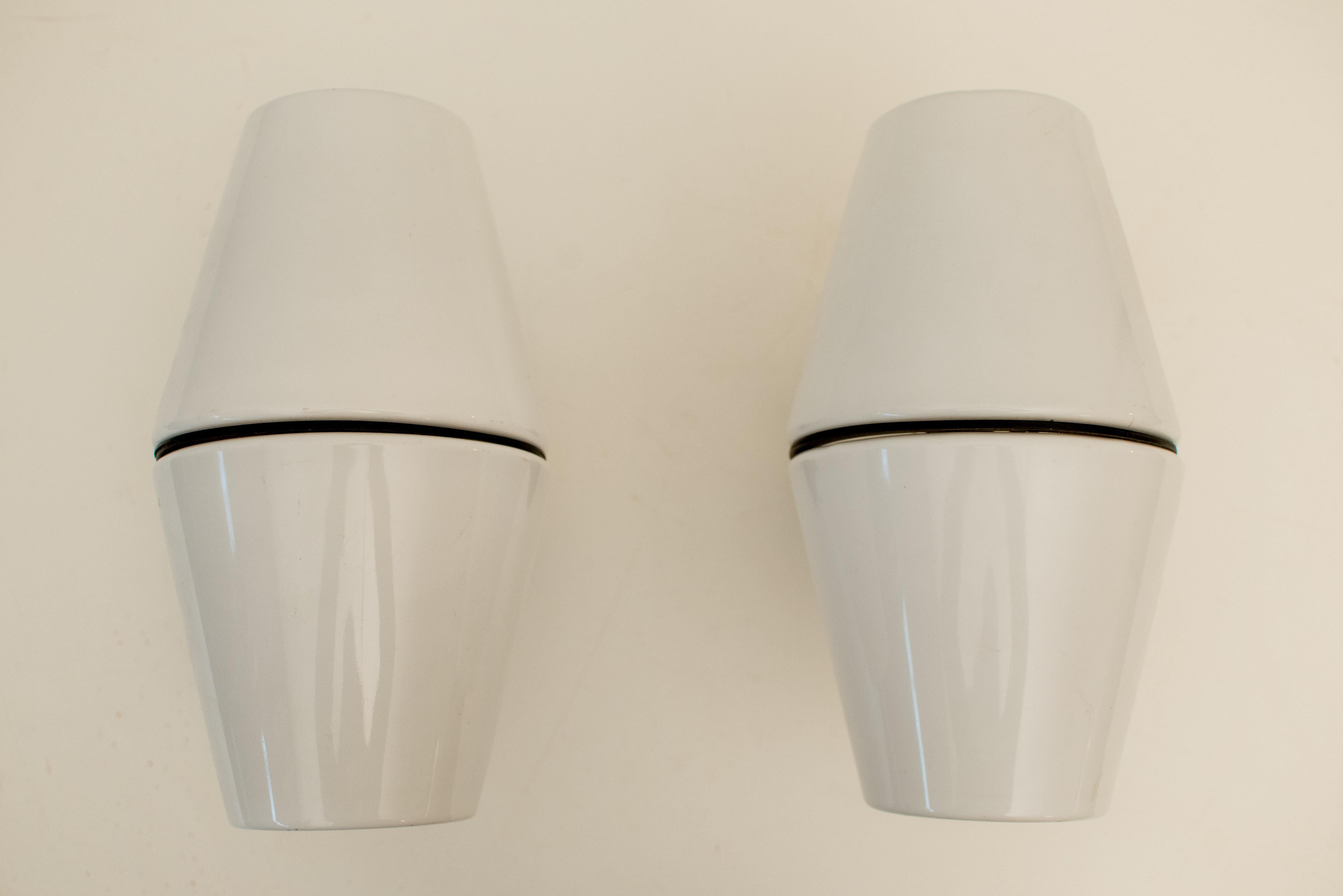 This pair of Scandinavian wall lamps with one bulb each was produced in the 1970s.
 