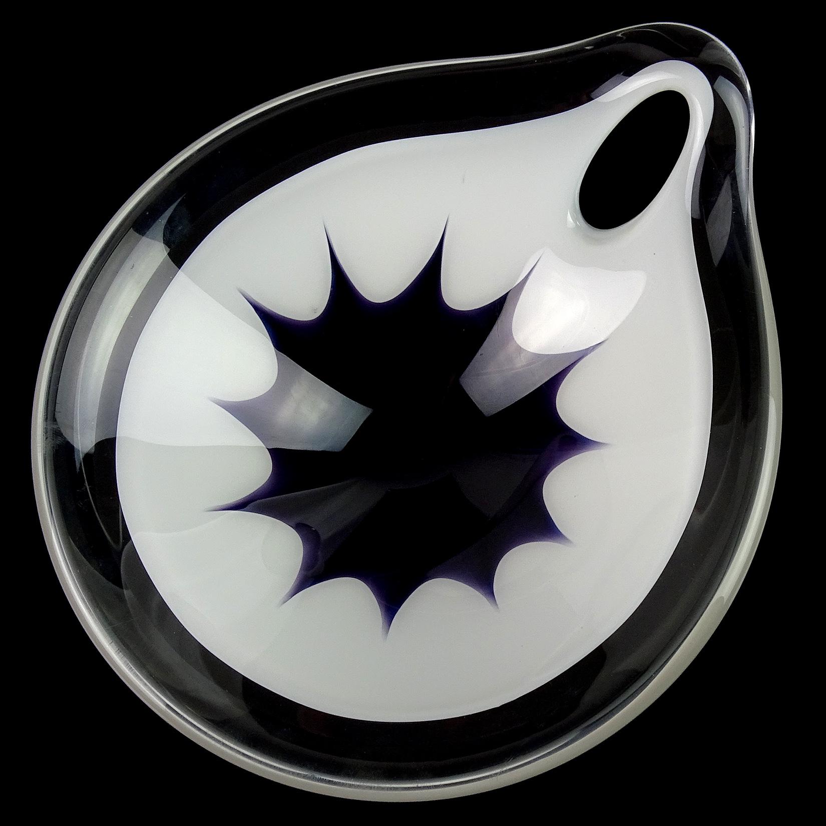 Beautiful vintage Scandinavian hand blown black star and white art glass pierced handle bowl. Created in the manner of designer Paul Kedelv and Flygsfors. The piece is signed underneath. Unusual design, deep bowl with handle. Would make a great
