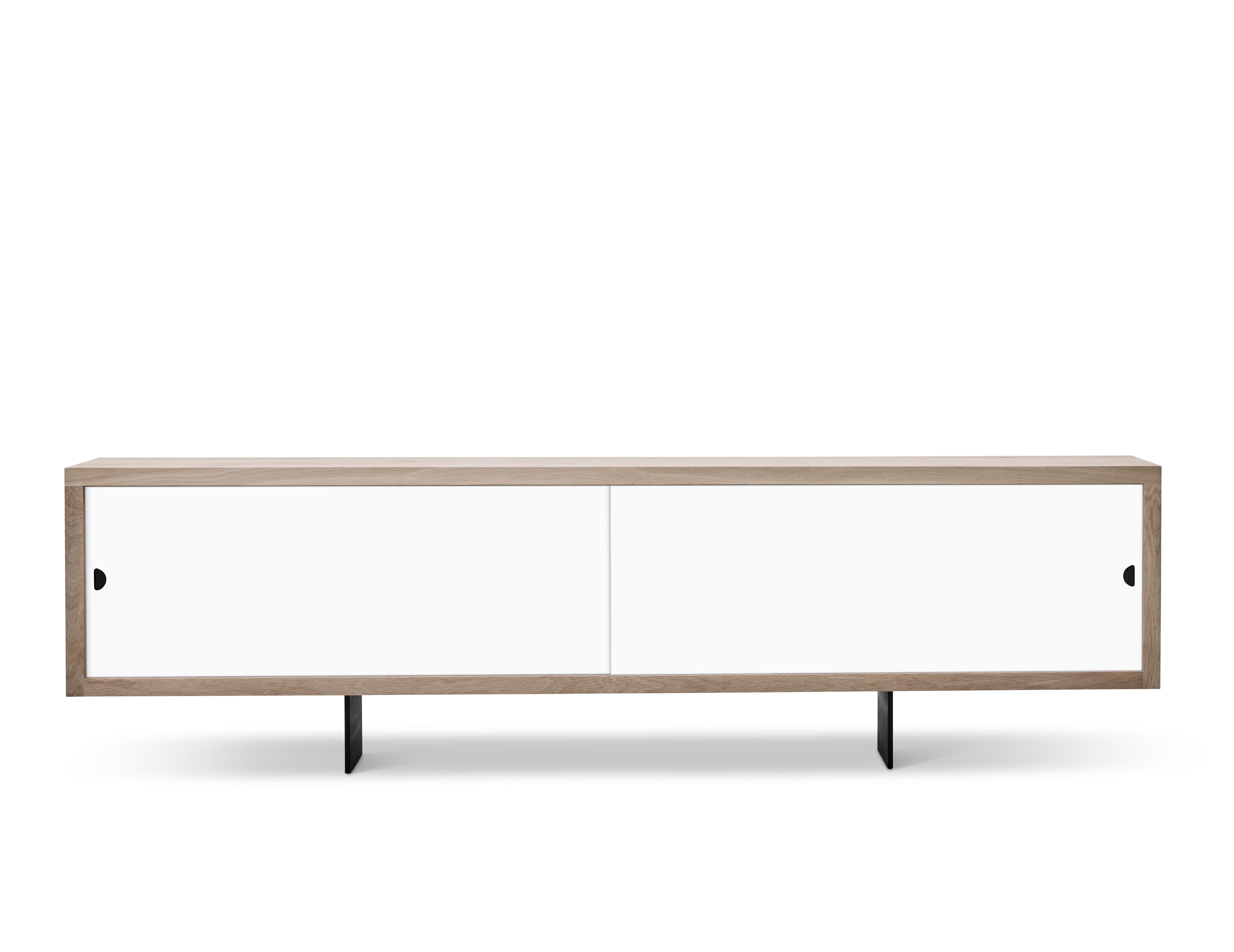GRAND Sideboard by Jacob Plejdrup for DK3, 2016

Sideboard with sliding doors, available in castoro, beige, black or white.
Dimensions: H 68 x 50 x 200

---
dk3 is known for the large plank tables, so it was obvious for designer and dk3