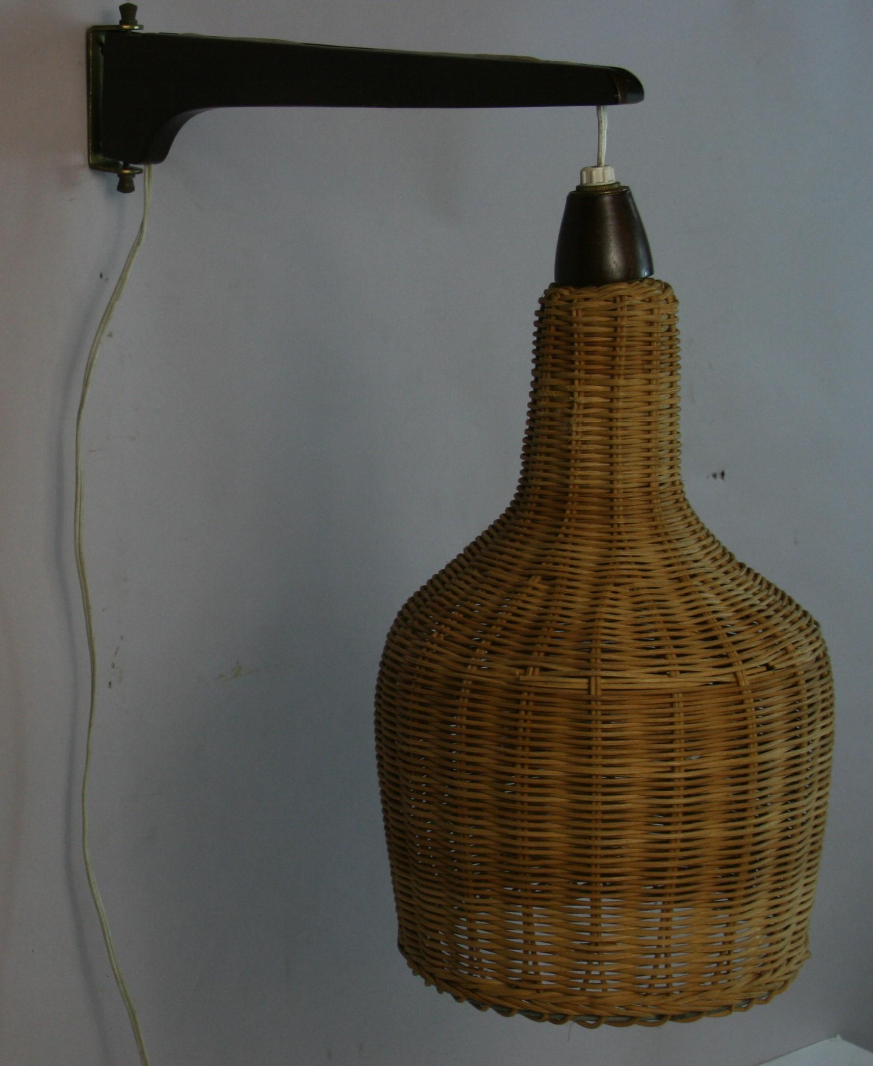 1879 Scandinavian wicker and wood swivel wall light with inline wall switch
Rewired Takes on 60 watt Edison based bulb