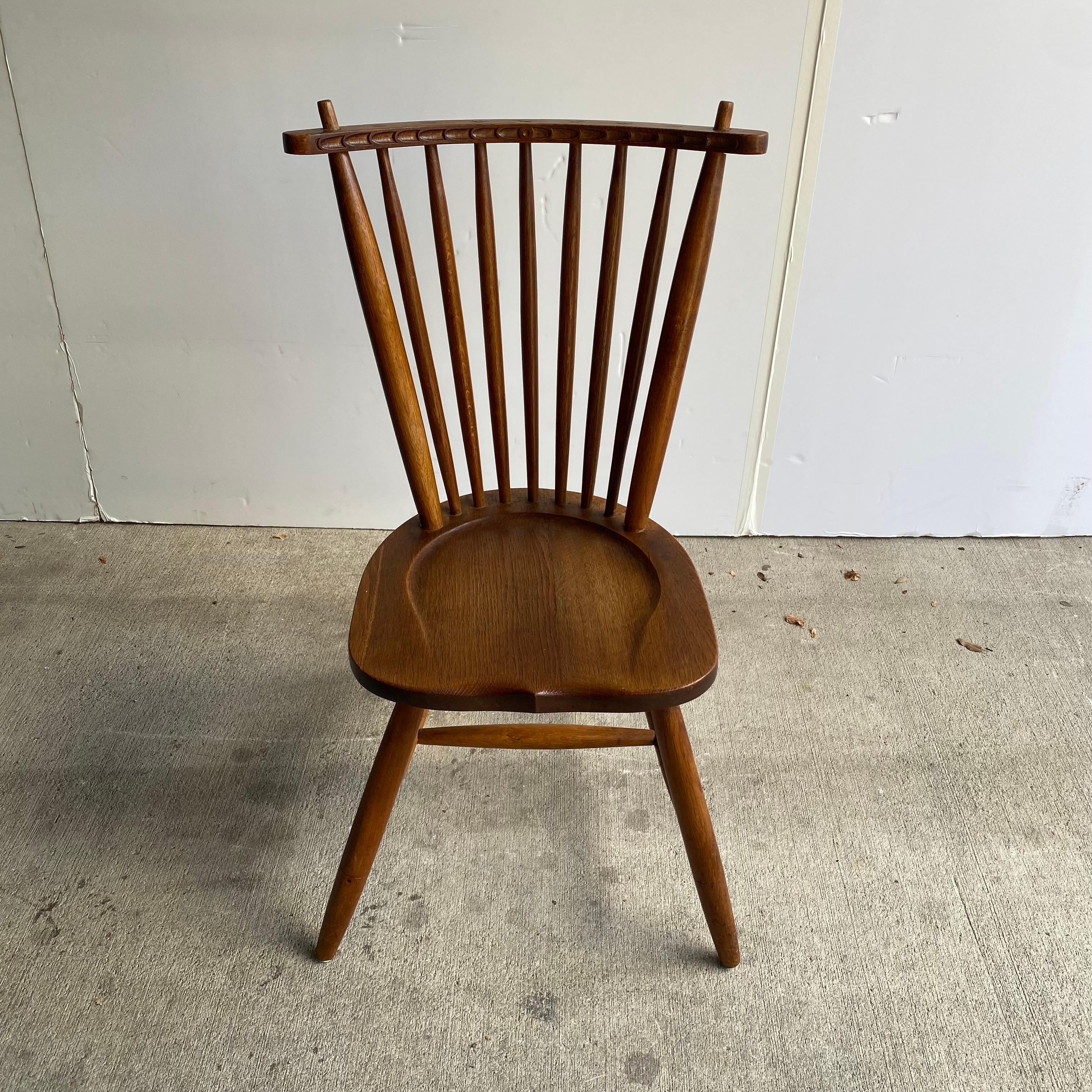 Classic Windsor chair styling meets Scandinavian modern. Spindle chair with splayed legs. Denmark, 1950's.