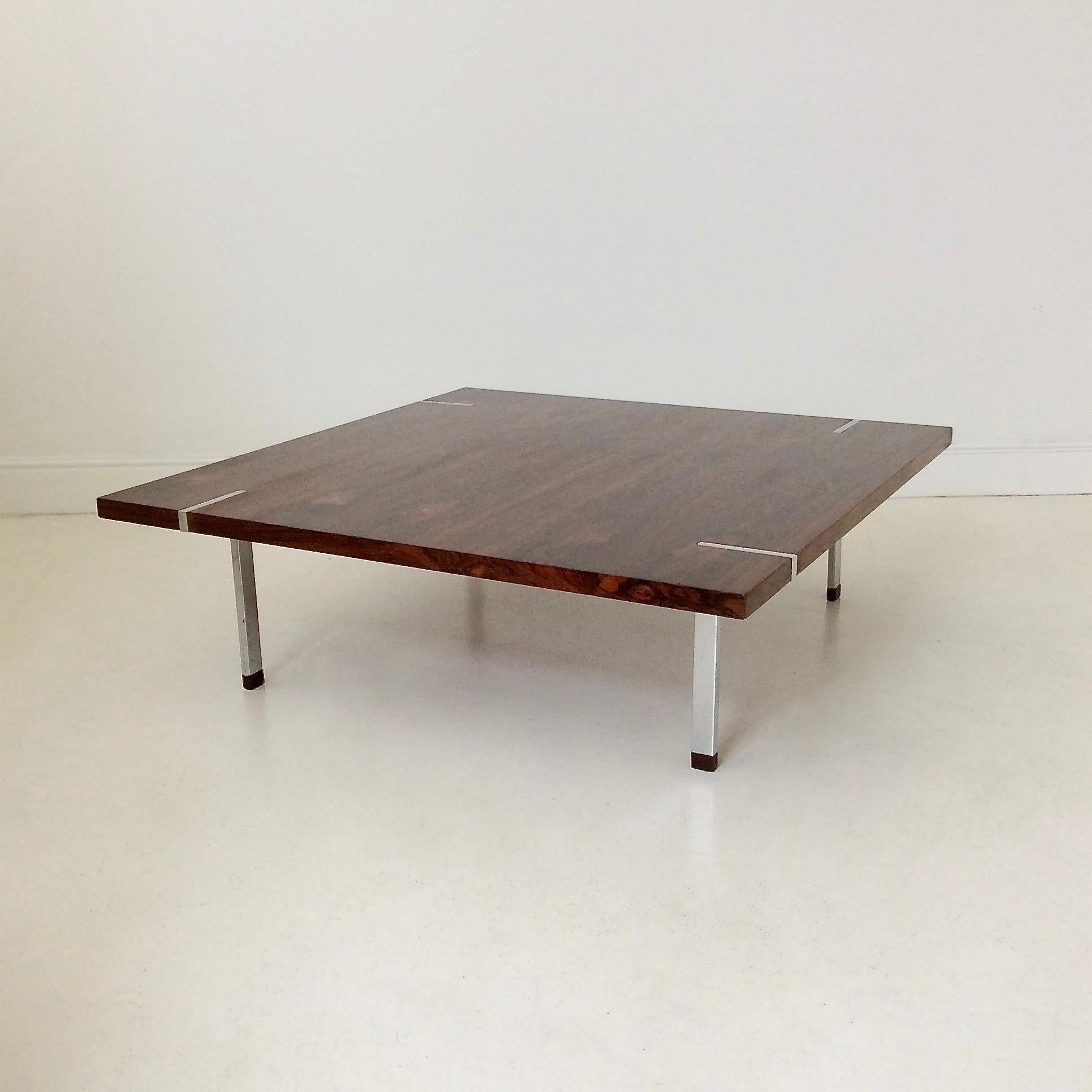 Italian midcentury rosewood square coffee table, circa 1960, designed by Gastone Rinaldi
Chrome-plated steel, rosewood.
Dimensions: 95 x 95 cm, 29 cm H.
Original condition.
We ship worldwide.
  