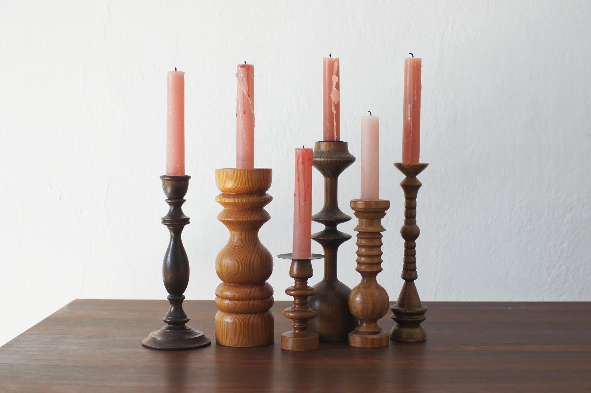 This set of Scandinavian wooden candle holders is a perfect example of the simplicity and natural beauty that characterize Scandinavian design. Made of wood, often from light species such as oak, beech or pine, these candlesticks exude warmth and