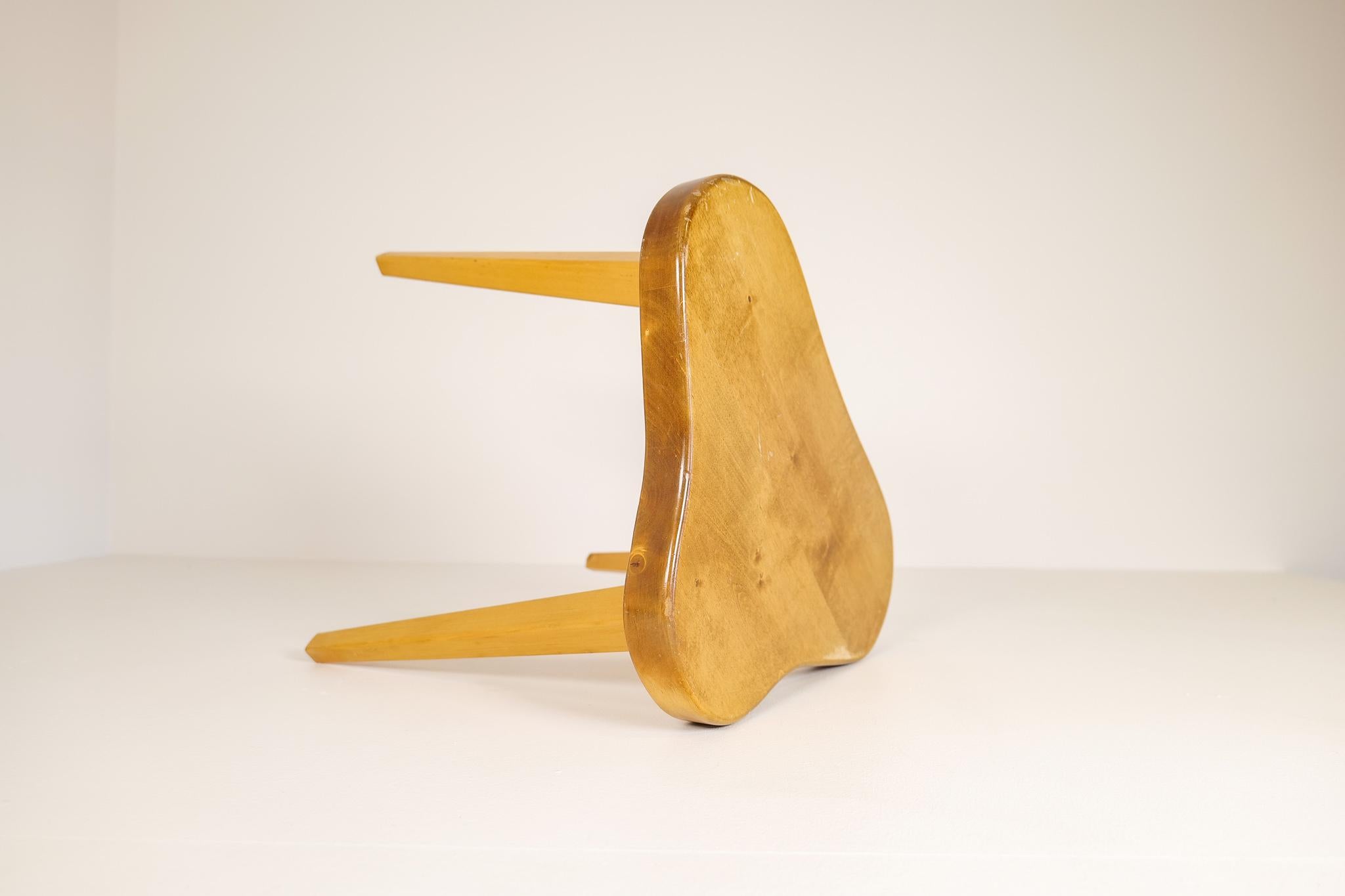 A stool in lacquered birch produced in, Sweden, 1970s.
This stool is a good example of simple yet good and naive craftsmanship with minimalistic stile known to Scandinavian furniture. 

Good original condition with a beautiful patina, the lacquer