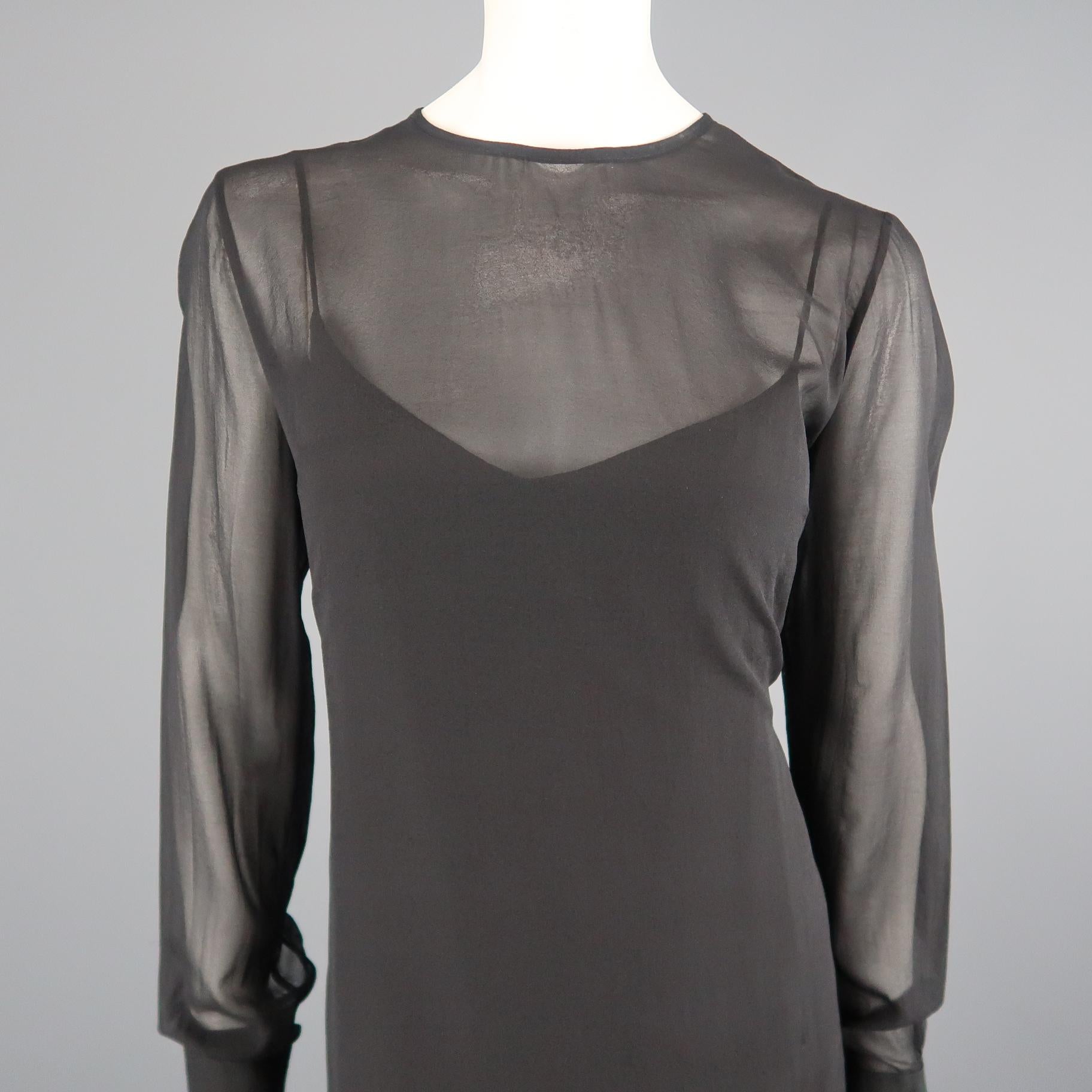 SCANLAN&THEODORE shift dress comes in black silk blend chiffon with a round neck, and three button cuffs. With Slip. Made in Australia.
 
Excellent Pre-Owned Condition.
Marked: 12
 
Measurements:
 
Shoulder: 16 in.
Bust: 42 in.
Waist: 40 in.
Hip: 42