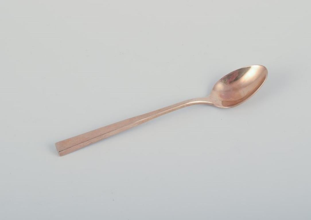 20th Century 'Scanline' brass flatware by Sigvard Bernadotte. Four-person dinner set. For Sale