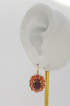 Scapolite Cat's Eye, Orange Sapphire and Diamond Earrings set in 18K Gold