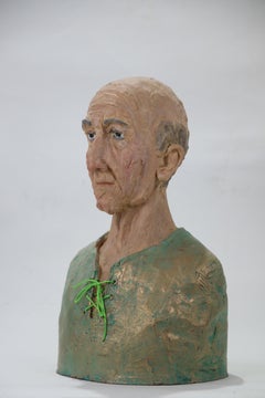 Busto expresionista de cerámica de un anciano con pan de cobre y estuco