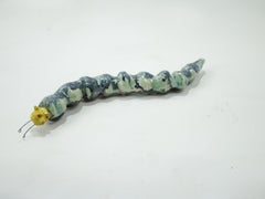 Scultura contemporanea allungata in ceramica Forma organica segmentata Piccola scala