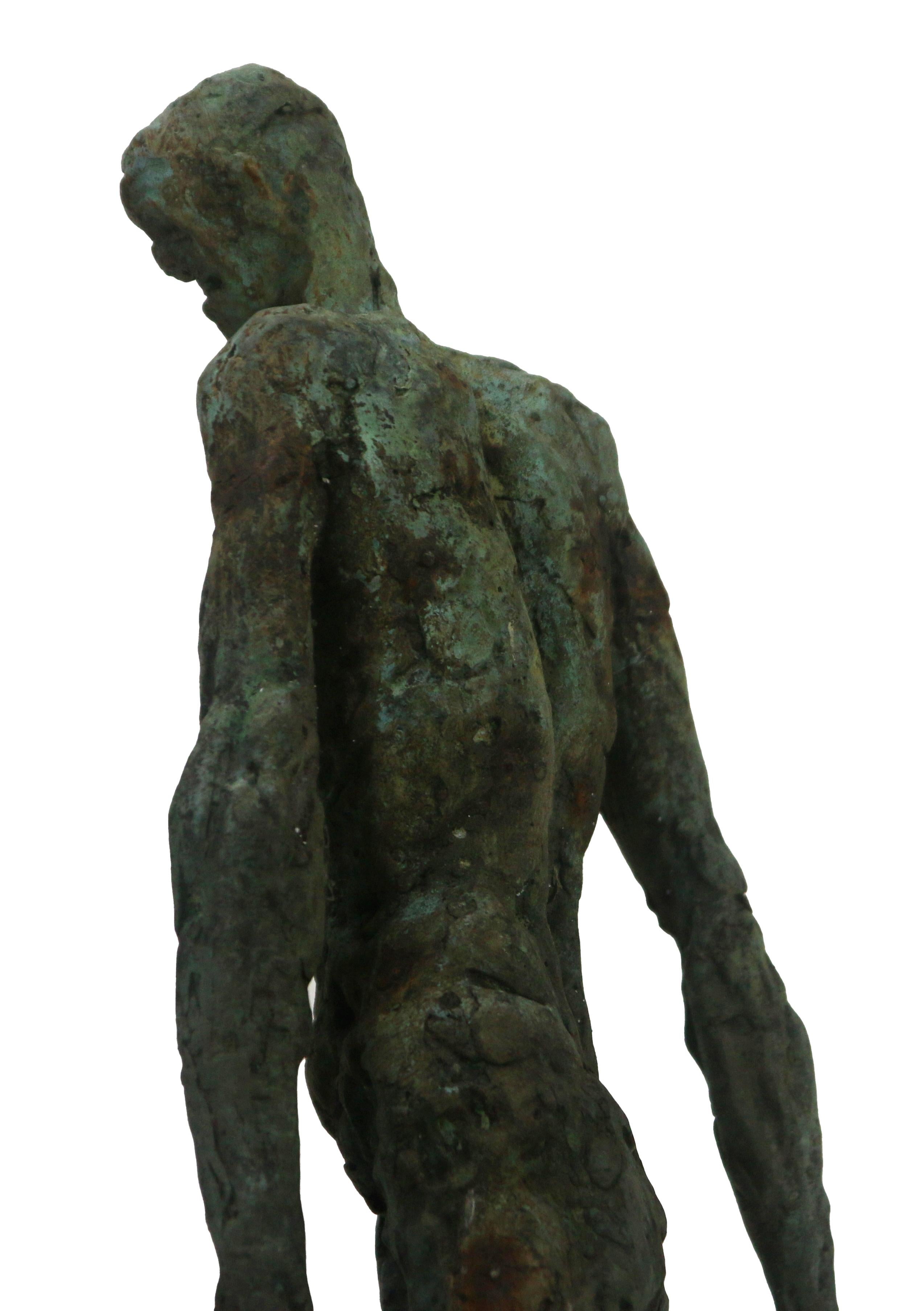 Expressionist bronze sculpture in lost wax casting exploring contained emotion and inner tension. Containing the Rage is a unique figurative work by Galician sculptor Óscar Aldonza, created entirely through the lost wax process, preserving every