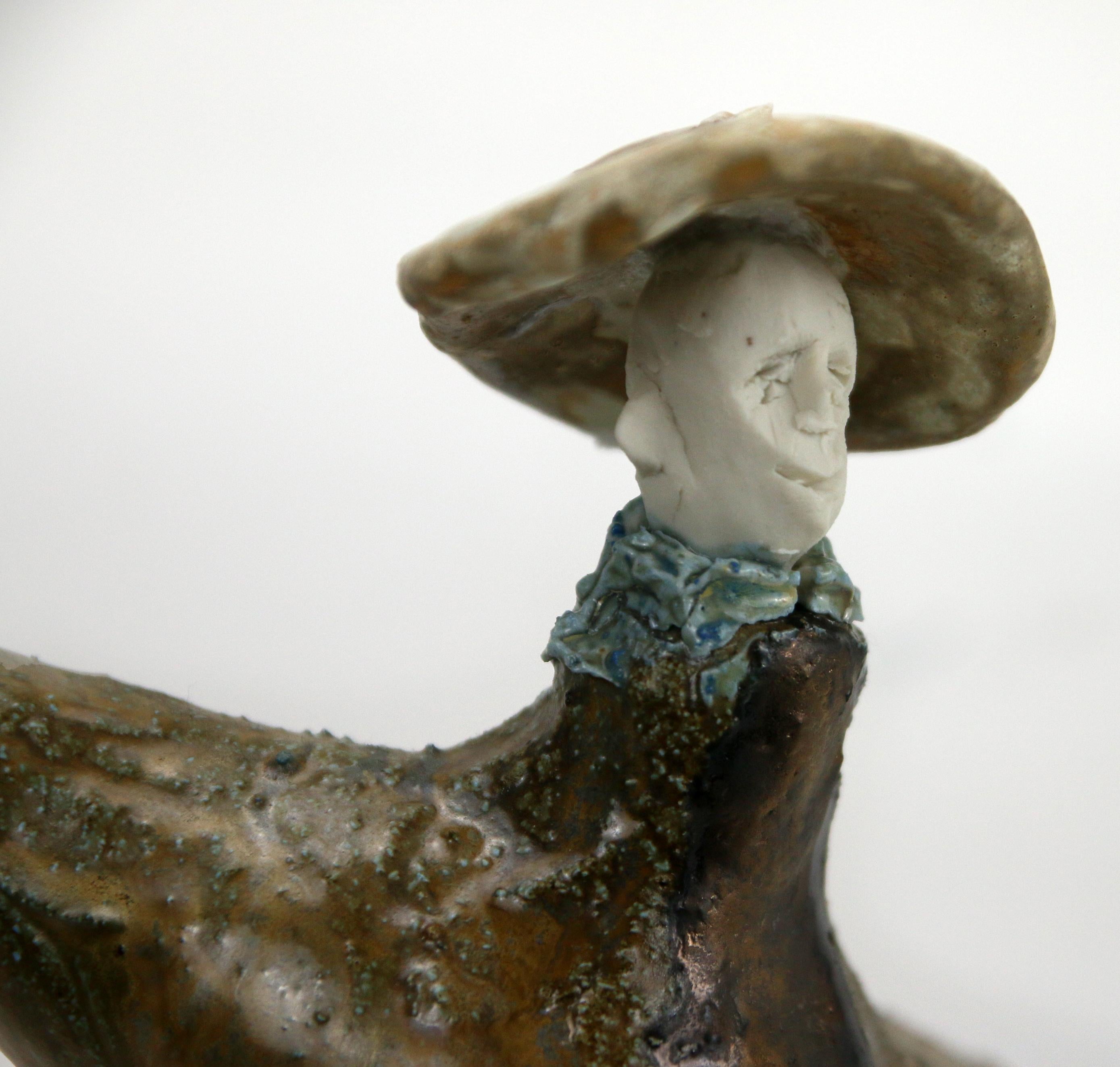 Expressive High Fire Ceramic Figure with Forged Iron Hook Extravagant Series - Brown Figurative Sculpture by Óscar Aldonza Torres