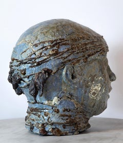 Testa con bandana - Scultura in ferro e refrattario smaltata in mare ad alta temperatura