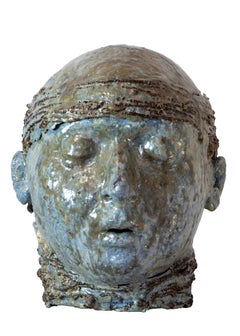 Cabeza con pañuelo - Escultura de hierro y refractario esmaltado marino a alta temperatura