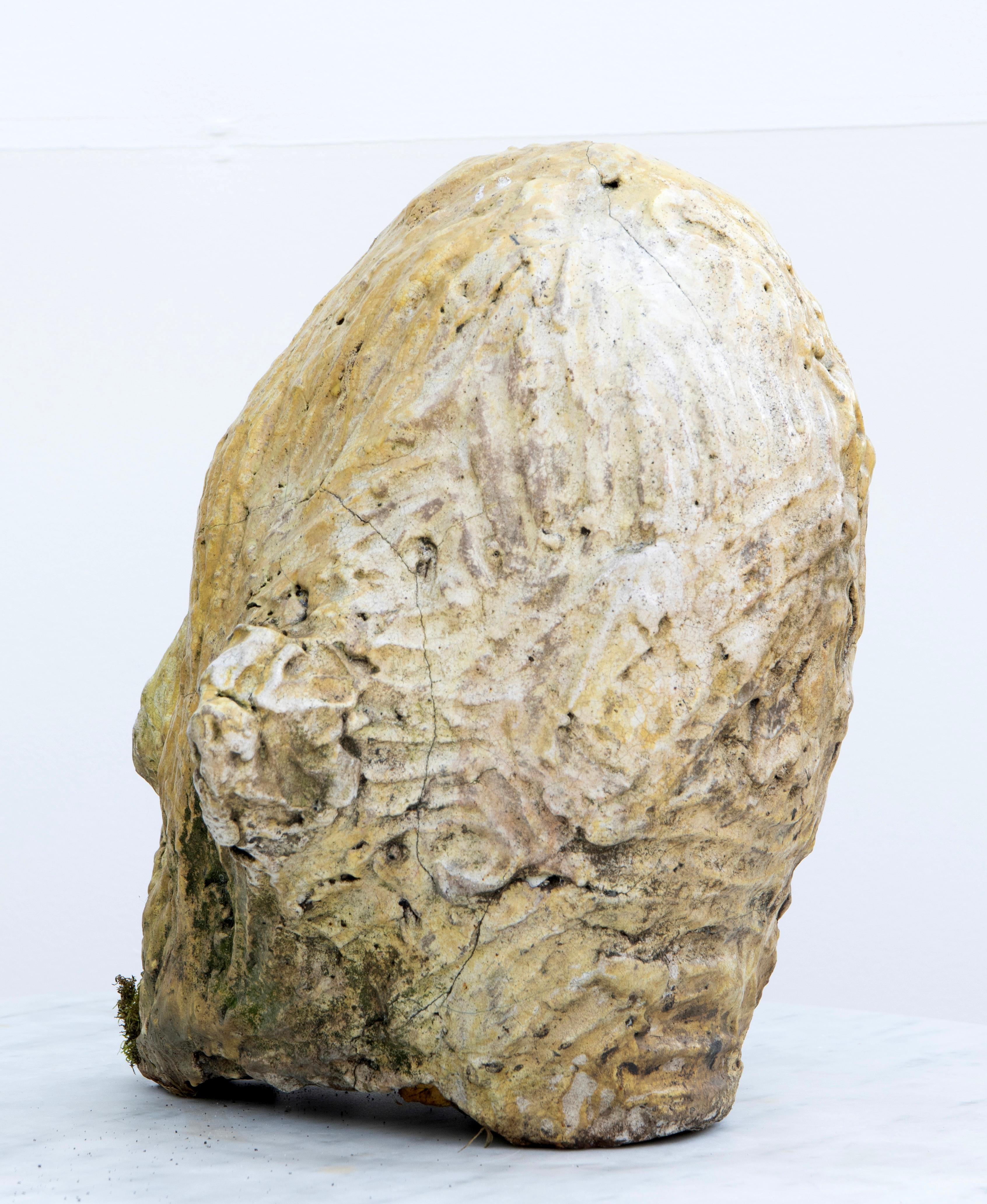 Testa nº 8 is an expressionist ceramic head sculpture from the Testas series, modeled in white stoneware and finished with a distinctive bismuth raku glaze. This ceramic head, measuring 41 × 36 × 32 cm, embodies the raw and organic qualities of the