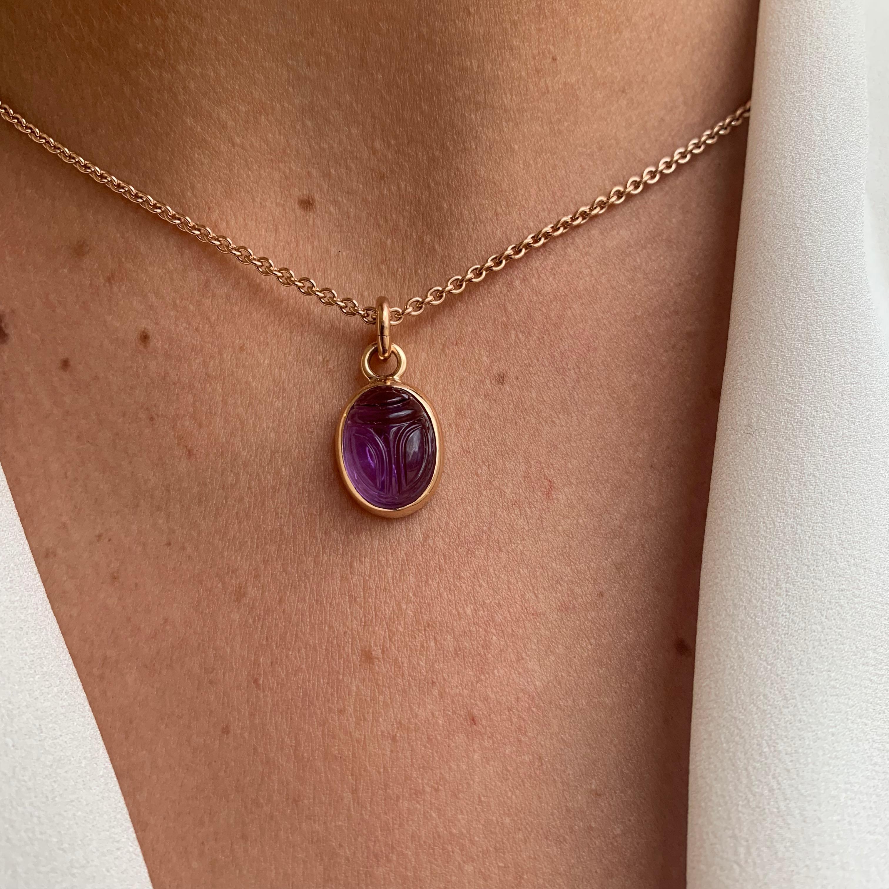 Scarab pendant in 18 carat rose gold with amethyst of 9.07 ct, carefully engraved by hand into the shape of a scarab. The ancient Egyptian lucky charm is a symbol of birth, regeneration, and good health. 