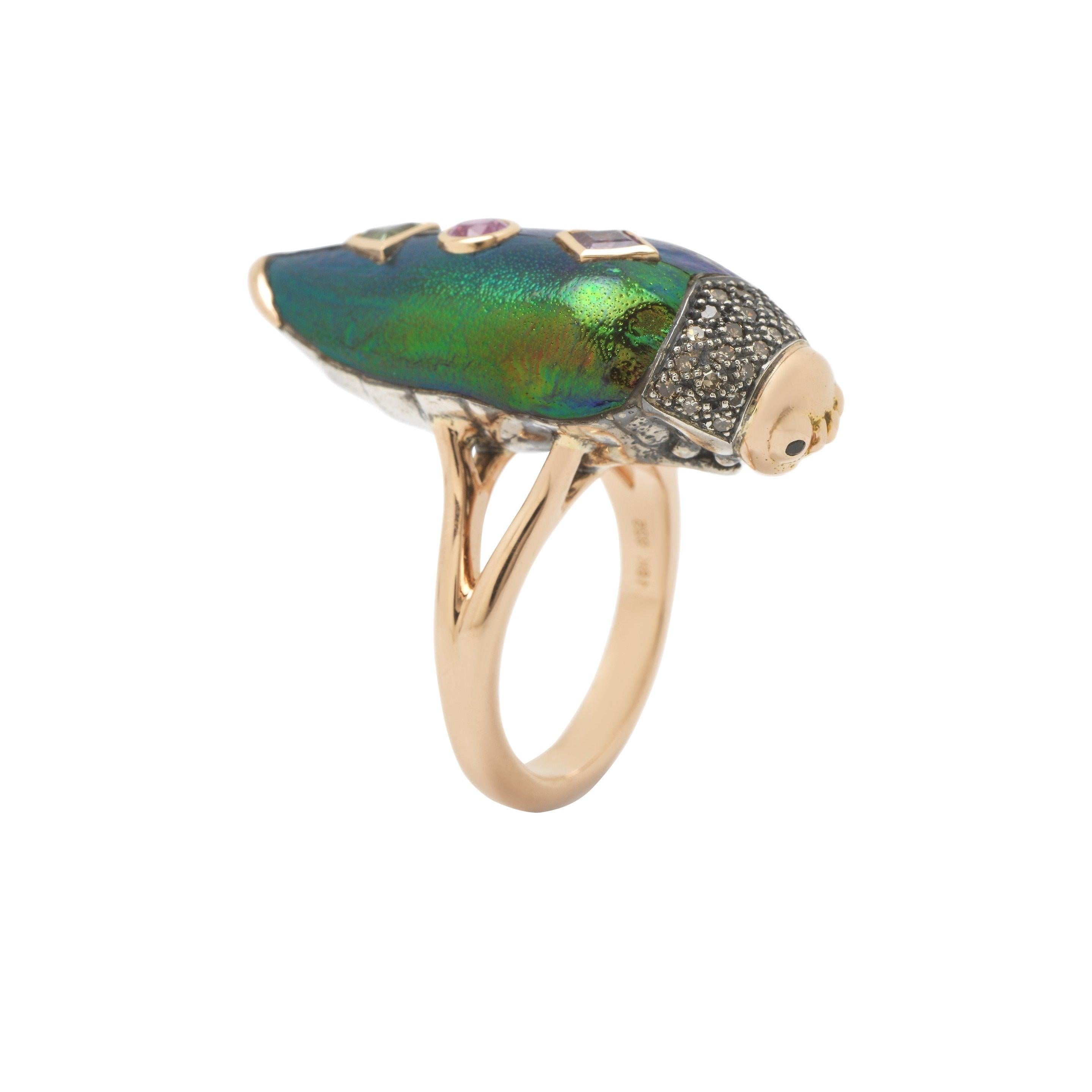 The Scarab beetle has long been prized as an auspicious symbol, as far back as ancient Egyptian times. The Scarab Pop Art Ring is Bibi’s modern take on this sacred amulet. The ring is crafted in 18k rose gold and sterling silver and set with a real