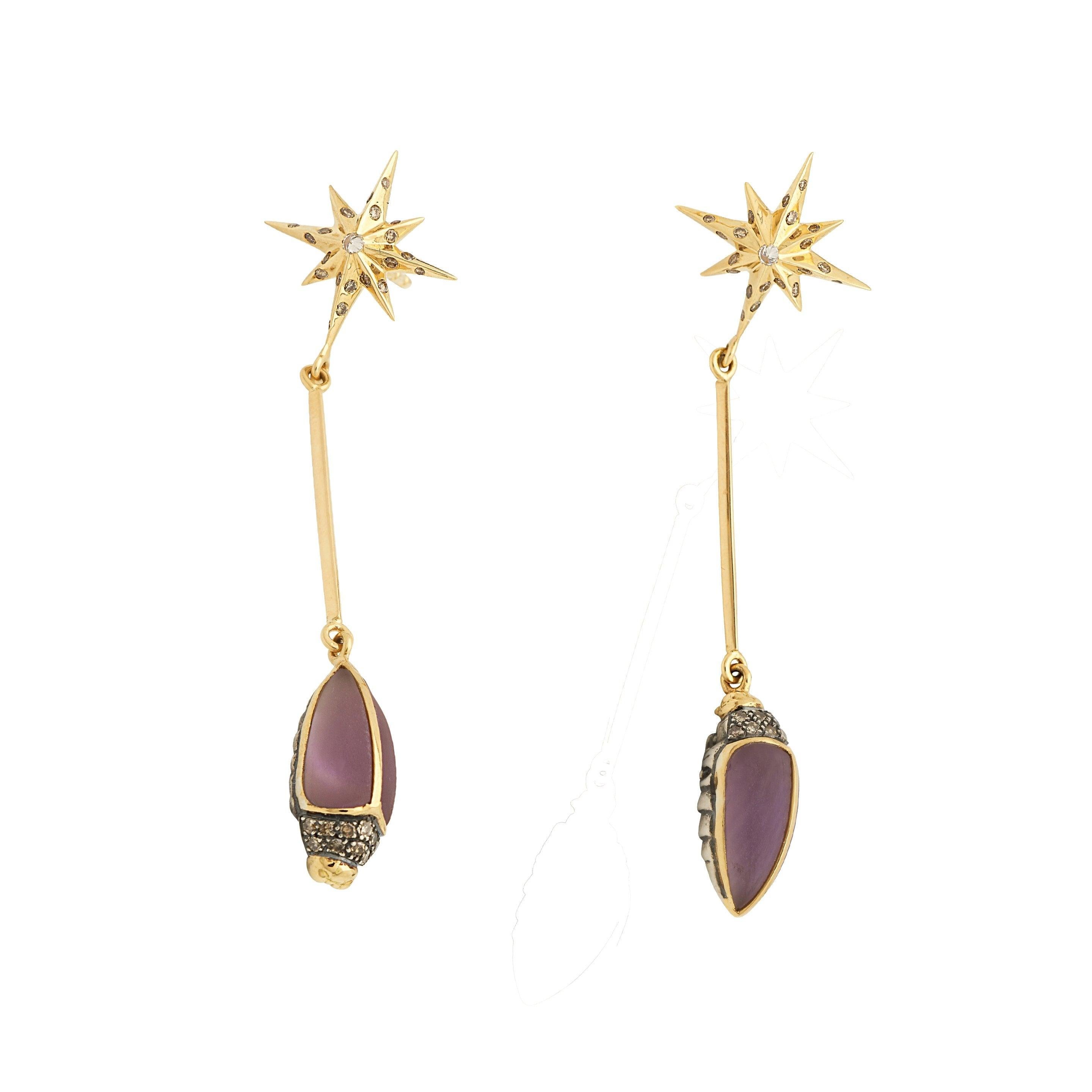 Sleek and graphic, these drop earrings are crafted as fine bars in 18k yellow gold, and are set with dazzling, diamond-embellished star motifs at the posts. The scarab motifs at the drop are fashioned in 18k yellow gold and sterling silver, and set